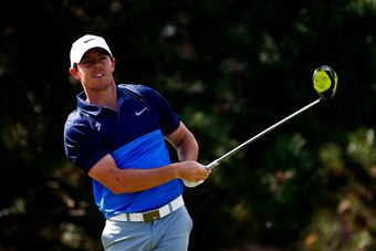 LAKE FOREST, IL - SEPTEMBER 20:  Rory McIlroy of Northern Ireland plays his shot from the fourth tee during the Final Round of the BMW Championship at Conway Farms Golf Club on September 20, 2015 in Lake Forest, Illinois.  (Photo by Jamie Squire/Getty Ima