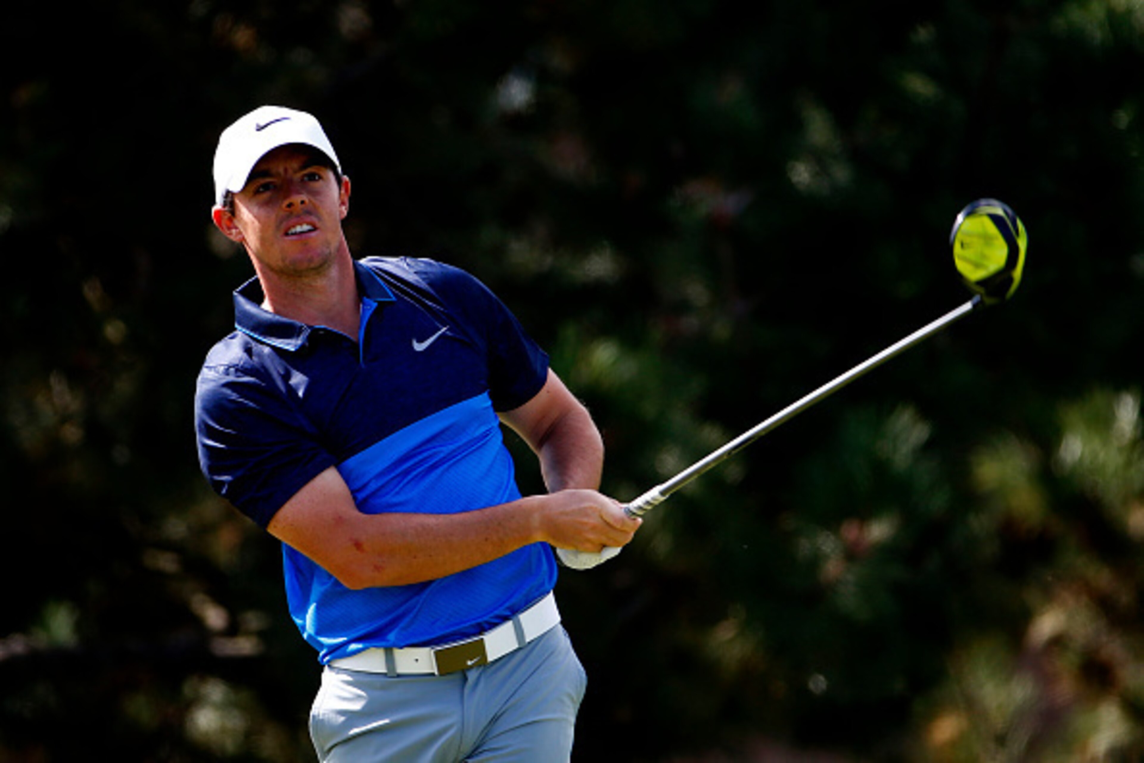 LAKE FOREST, IL - SEPTEMBER 20:  Rory McIlroy of Northern Ireland plays his shot from the fourth tee during the Final Round of the BMW Championship at Conway Farms Golf Club on September 20, 2015 in Lake Forest, Illinois.  (Photo by Jamie Squire/Getty Ima