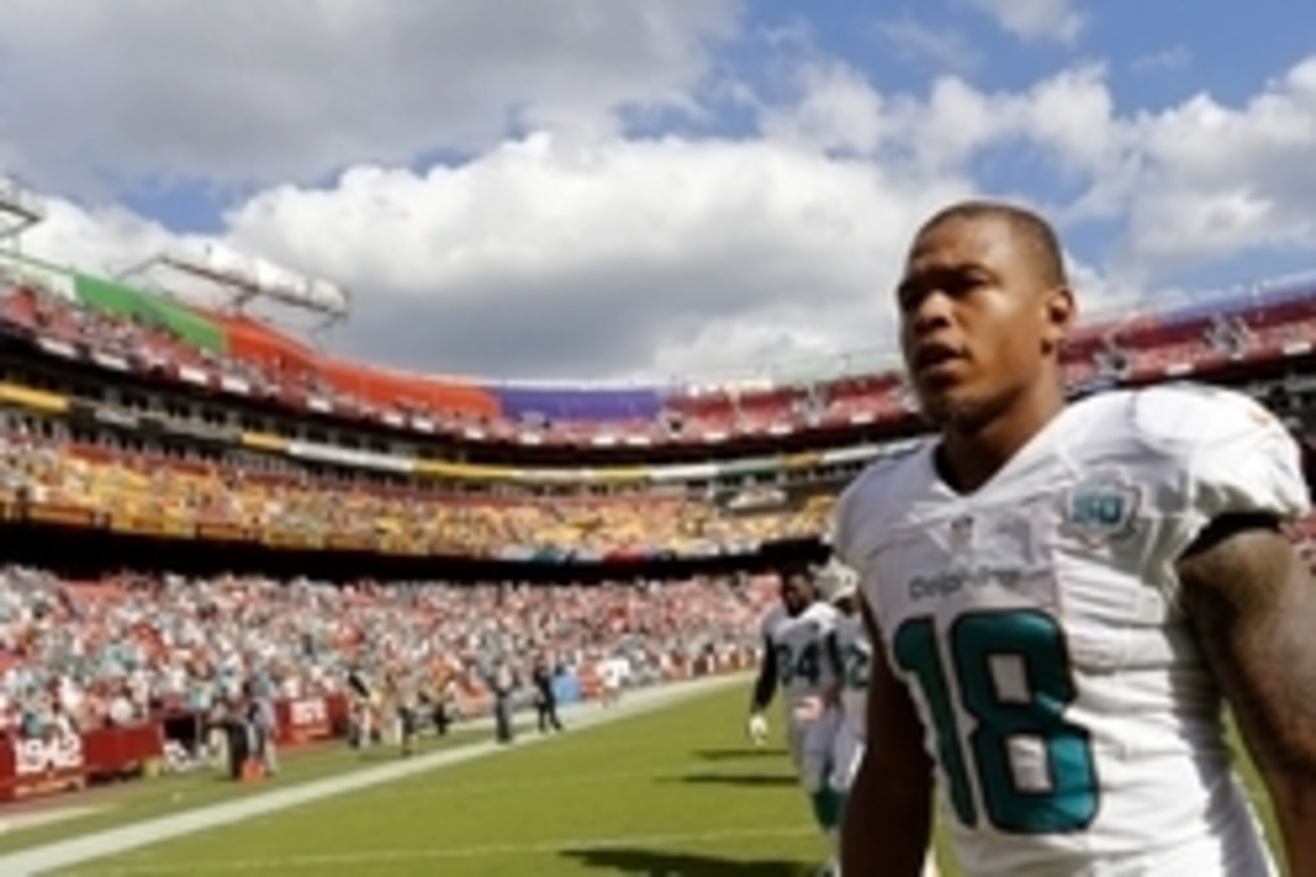 Sep 13, 2015; Landover, MD, USA; Miami Dolphins wide receiver Rishard Matthews (18) walks off the field after the Dolphins' game against the Washington Redskins at FedEx Field. The Dolphins won 17-10. Mandatory Credit: Geoff Burke-USA TODAY Sports