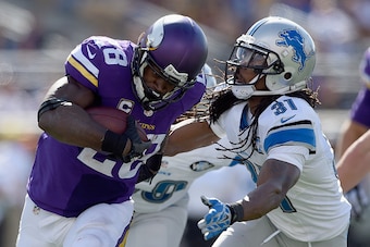 MINNEAPOLIS, MN - SEPTEMBER 20: Adrian Peterson #28 of the Minnesota Vikings carries the ball against Rashean Mathis #31 of the Detroit Lions during the fourth quarter of the game on September 20, 2015 at TCF Bank Stadium in Minneapolis, Minnesota. The Vi