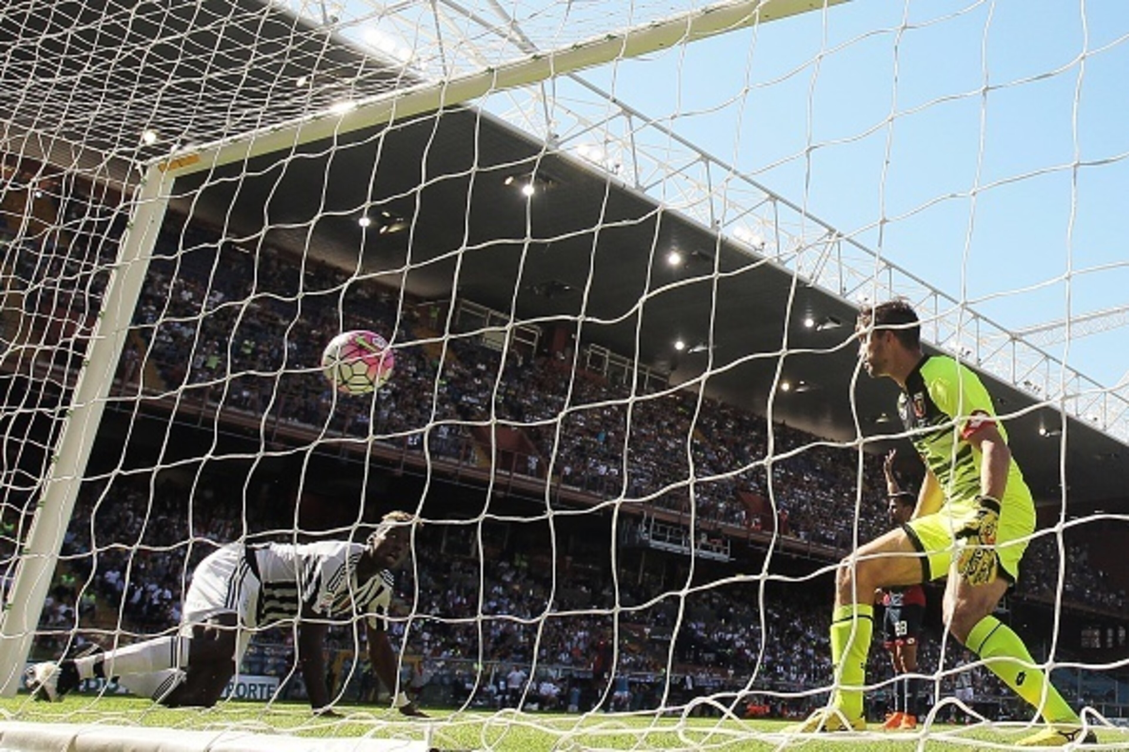 Juventus' French midfielder Paul Pogba (L) scores during the Italian Serie A football match between Genoa and Juventus on September 20, 2015 at the Luigi Ferraris Stadium in Genoa. AFP PHOTO / MARCO BERTORELLO (Photo credit should read MARCO BERTO Juventus' French midfielder Paul Pogba (L) scores during the Italian Serie A football match between Genoa and Juventus on September 20, 2015 at the Luigi Ferraris Stadium in Genoa. AFP PHOTO / MARCO BERTORELLO (Photo credit should read MARCO BERTO
