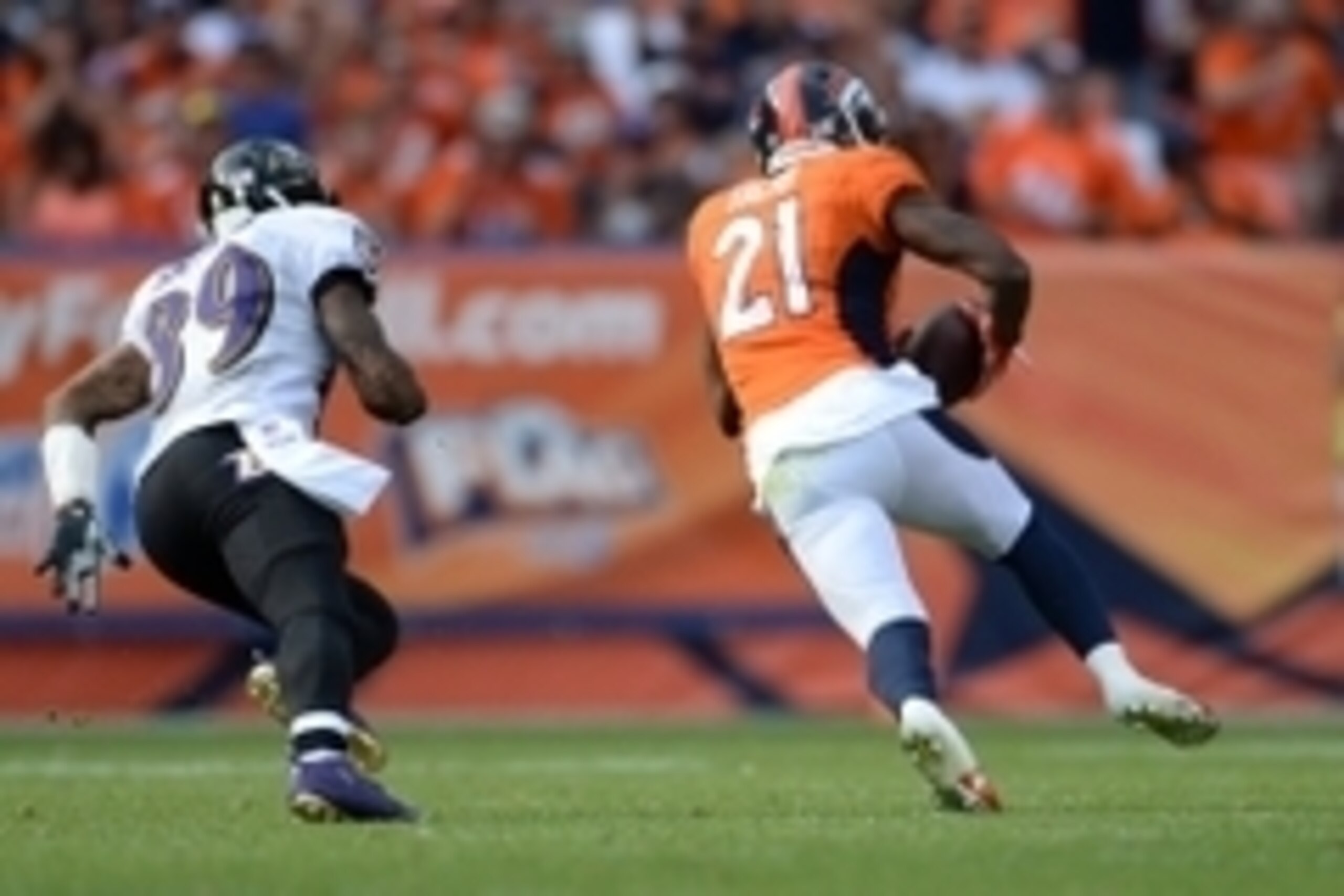 Sep 13, 2015; Denver, CO, USA; Denver Broncos cornerback Aqib Talib (21) pulls in a interception intended for Baltimore Ravens wide receiver Steve Smith (89) in the third quarter at Sports Authority Field at Mile High. The Broncos won 19-13. Mandatory Cre Sep 13, 2015; Denver, CO, USA; Denver Broncos cornerback Aqib Talib (21) pulls in a interception intended for Baltimore Ravens wide receiver Steve Smith (89) in the third quarter at Sports Authority Field at Mile High. The Broncos won 19-13. Mandatory Cre