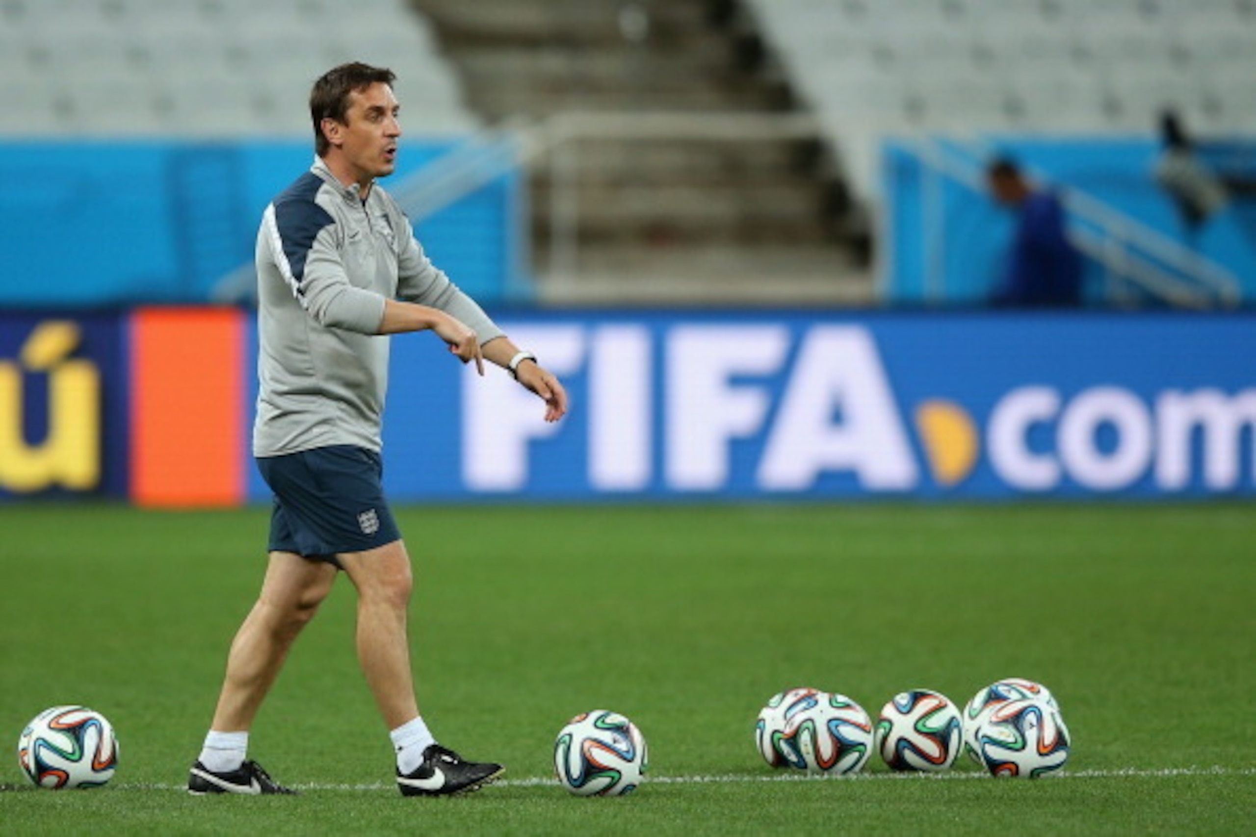 SAO PAULO, BRAZIL - JUNE 18:  England assistant coach Gary Neville looks on during an England training session ahead of the 2014 FIFA World Cup Brazil match against Uruguay at Arena de Sao Paulo on June 18, 2014 in Sao Paulo, Brazil.  (Photo by Richard He