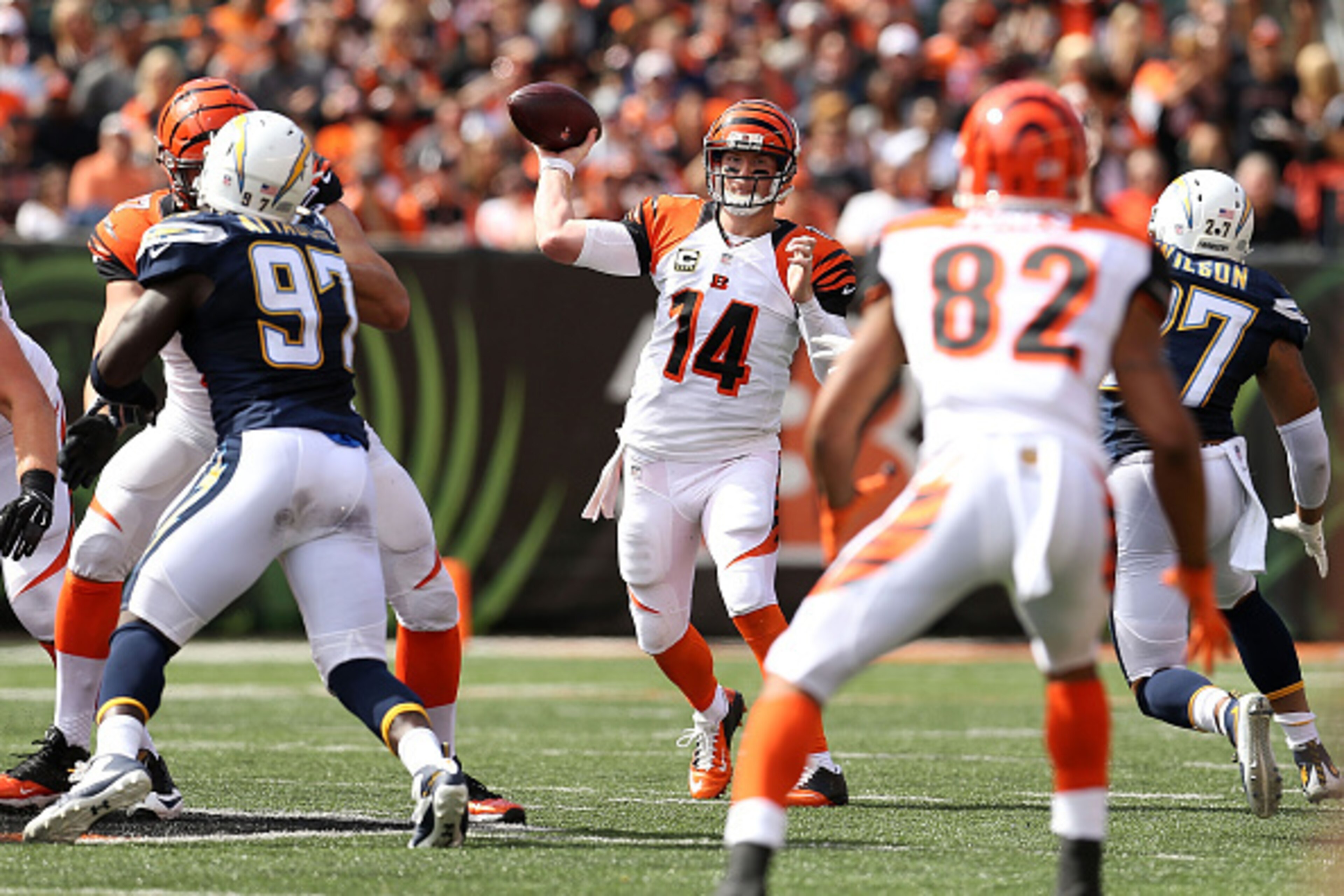 CINCINNATI, OH - SEPTEMBER 20:  Andy Dalton #14 of the Cincinnati Bengals looks to throw the ball to Marvin Jones #82 of the Cincinnati Bengals during the third quarter of the game against the San Diego Chargers at Paul Brown Stadium on September 20, 2015