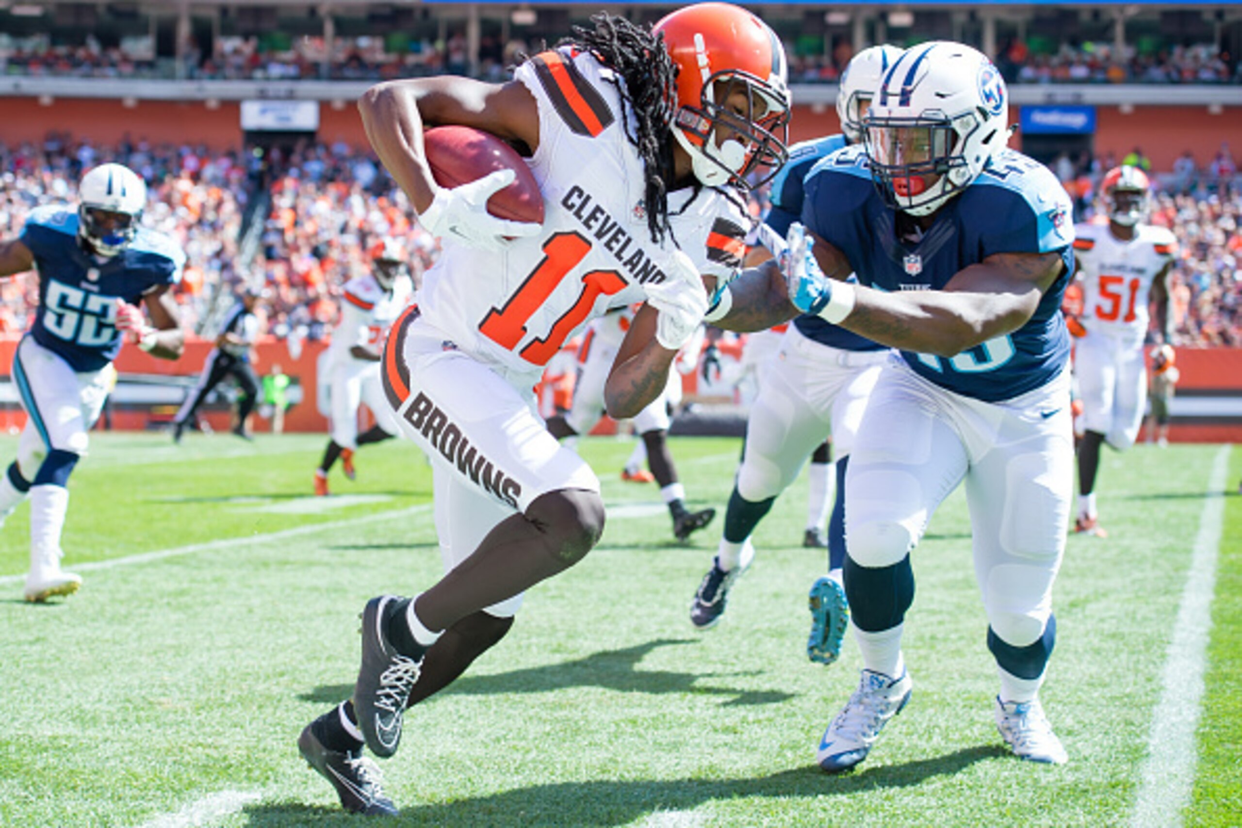 CLEVELAND, OH - SEPTEMBER 20: Wide receiver Travis Benjamin #11 of the Cleveland Browns returns a kickoff under pressure from fullback Jalston Fowler #45 of the Tennessee Titans during the second half at FirstEnergy Stadium on September 20, 2015 in Clevel