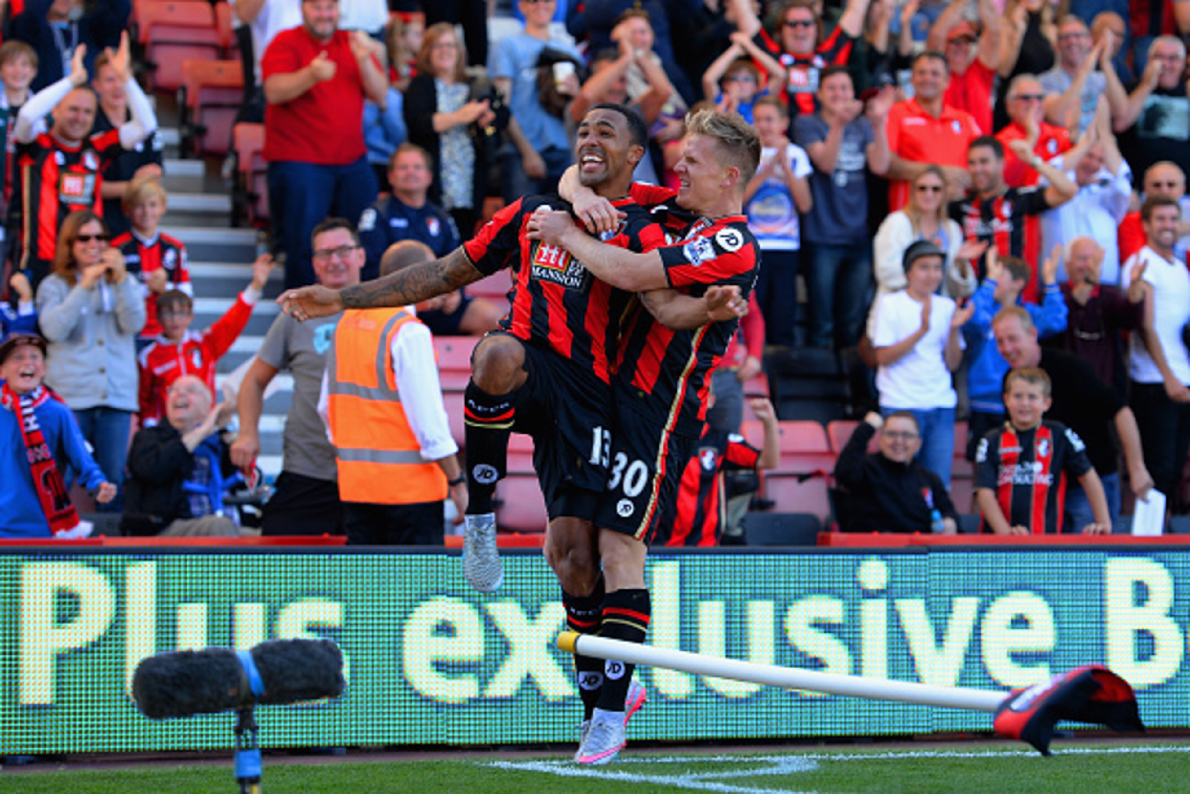 BOURNEMOUTH, ENGLAND - SEPTEMBER 19: Callum Wilson (L) of Bournemouth celebrates scoring his team's first goal with his team mate Matt Ritchie (R) during the Barclays Premier League match between A.F.C. Bournemouth and Sunderland at Vitality Stadium on S BOURNEMOUTH, ENGLAND - SEPTEMBER 19: Callum Wilson (L) of Bournemouth celebrates scoring his team's first goal with his team mate Matt Ritchie (R) during the Barclays Premier League match between A.F.C. Bournemouth and Sunderland at Vitality Stadium on S