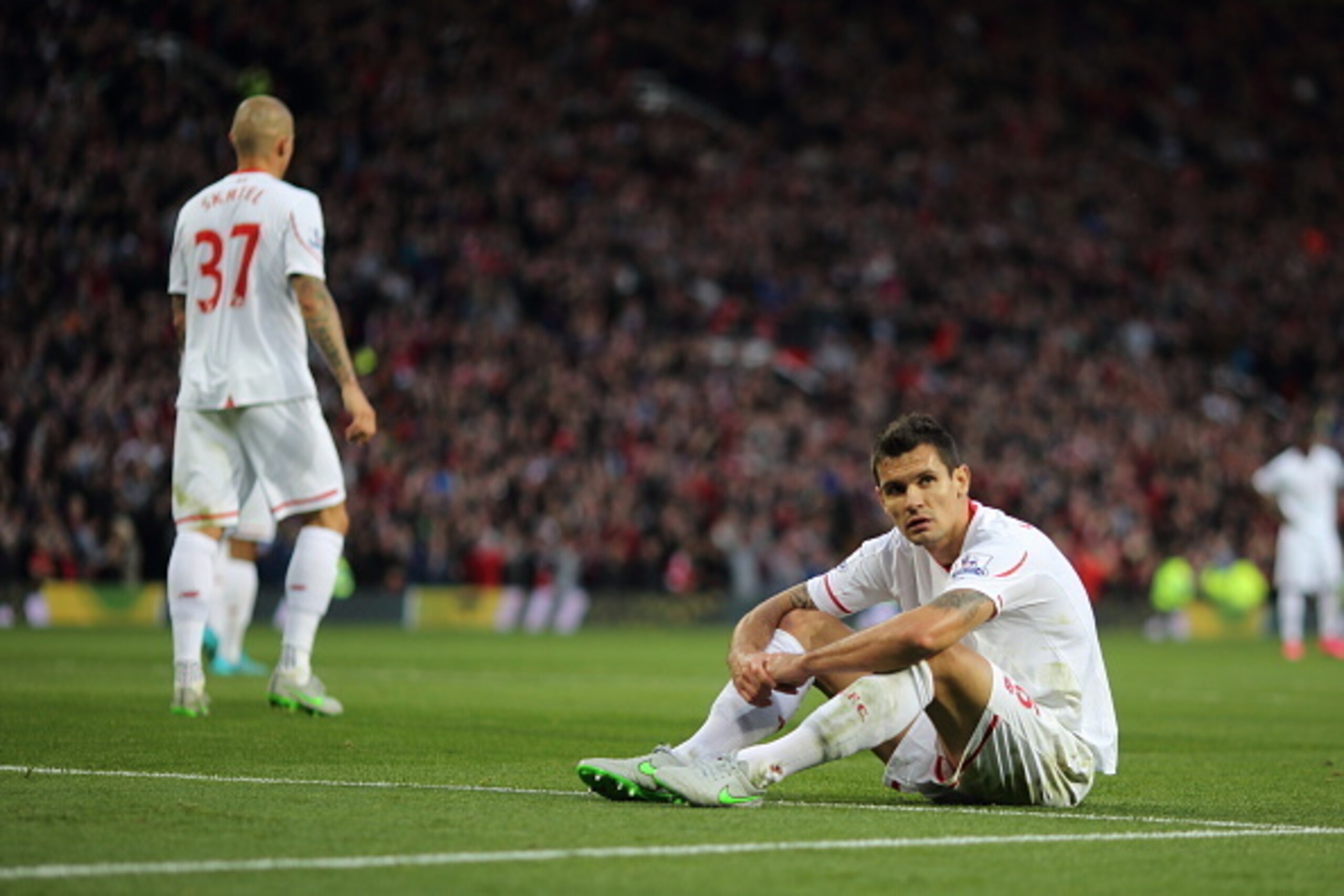 MANCHESTER, ENGLAND - SEPTEMBER 12:  A dejected Dejan Lovren of Liverpool after the third goal during the Barclays Premier League match between Manchester United and Liverpool on September 12, 2015 in Manchester, United Kingdom.  (Photo by Matthew Ashton 