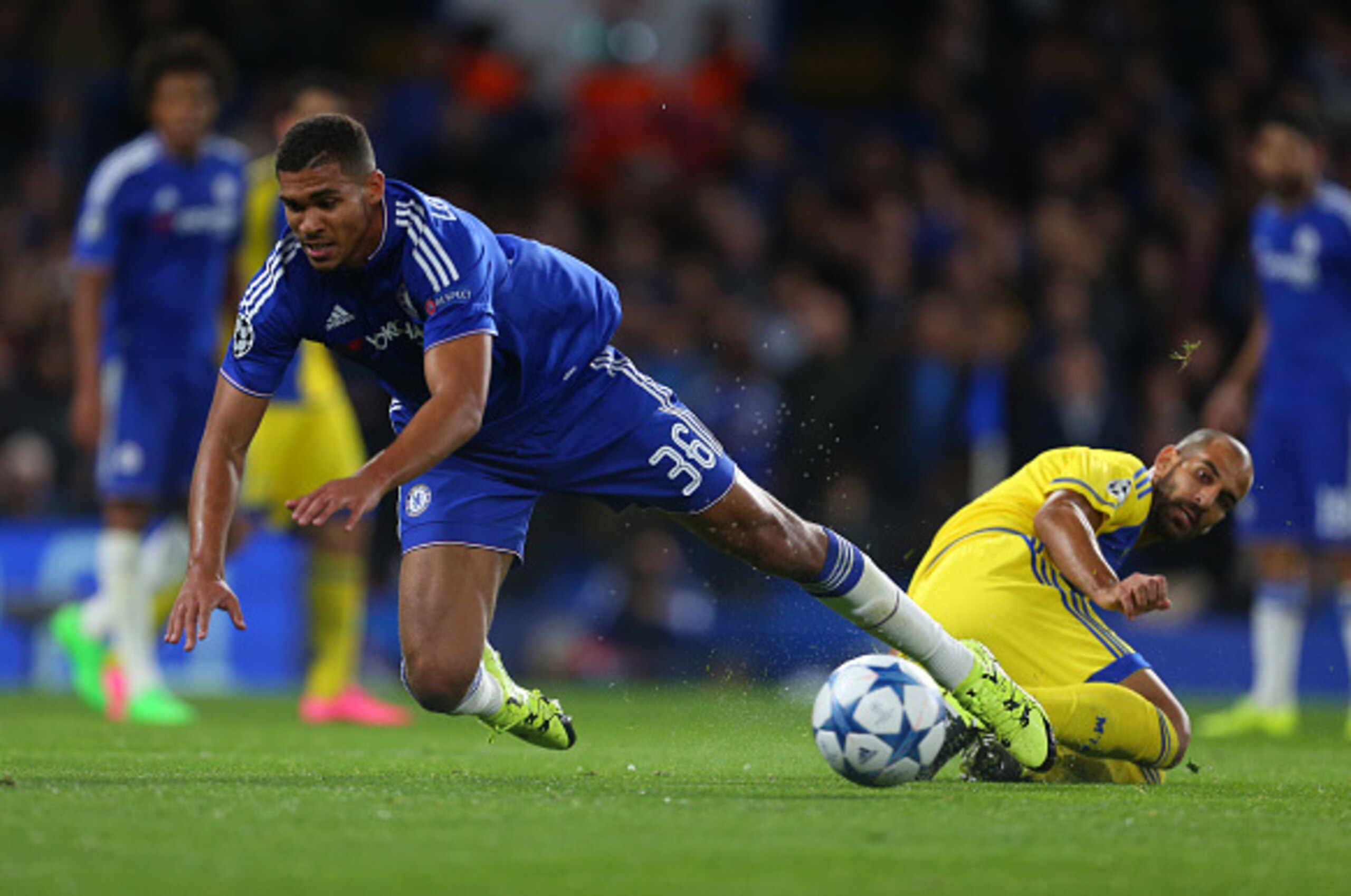 LONDON, ENGLAND - SEPTEMBER 16: Ruben Loftus-Cheek of Chelsea is tripped by Gal Alberman of Maccabi Tel Aviva during the UEFA Champions League match between Chelsea and Maccabi Tel-Aviv at Stamford Bridge on September 16, 2015 in London, United Kingdom.  