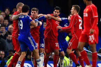 LONDON, ENGLAND - JANUARY 27:  Diego Costa of Chelsea clashes with Steven Gerrard and Emre Can of Liverpool during the Capital One Cup Semi-Final second leg between Chelsea and Liverpool at Stamford Bridge on January 27, 2015 in London, England.  (Photo b