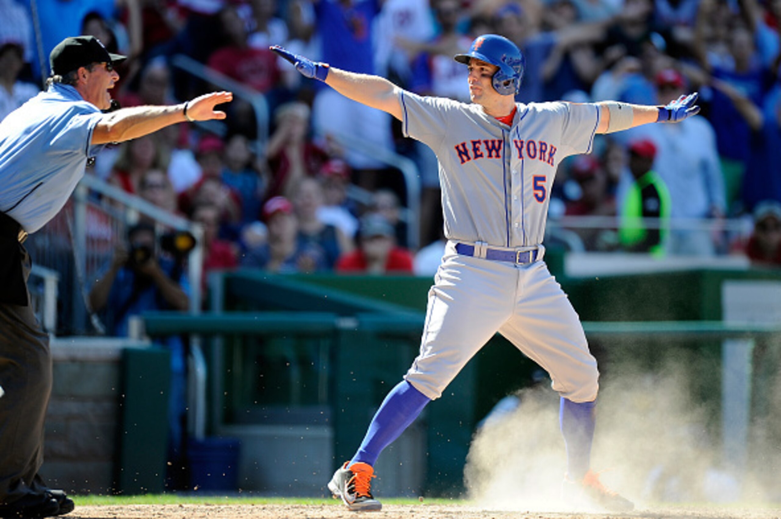 WASHINGTON, DC - SEPTEMBER 07:  David Wright #5 of the New York Mets signals he is safe after scoring in the seventh inning against the Washington Nationals at Nationals Park on September 7, 2015 in Washington, DC. New York won the game 8-5.  (Photo by Gr