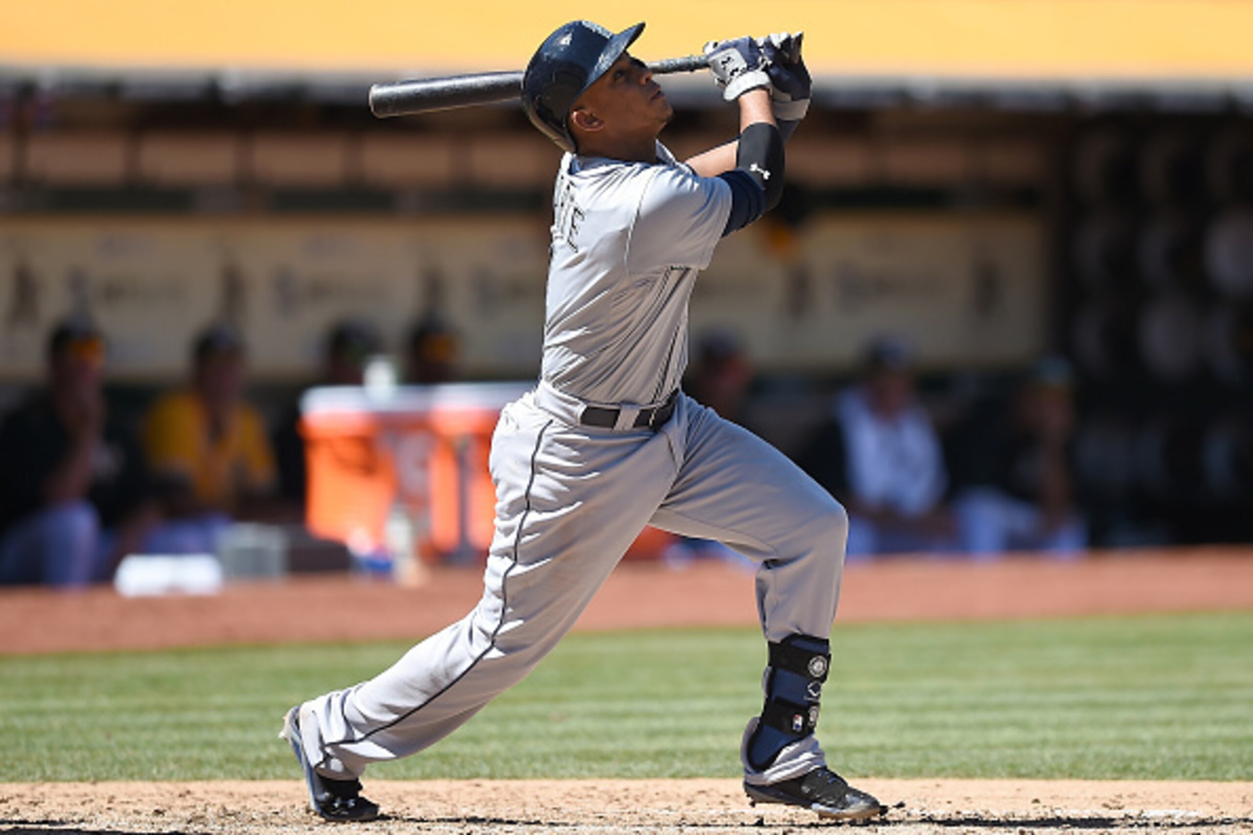 OAKLAND, CA - SEPTEMBER 06:  Ketel Marte #4 of the Seattle Mariners hits an rbi blooping single to right field that scores Brad Miller #5 against the Oakland Athletics in the top of the fifth inning at O.co Coliseum on September 6, 2015 in Oakland, Califo