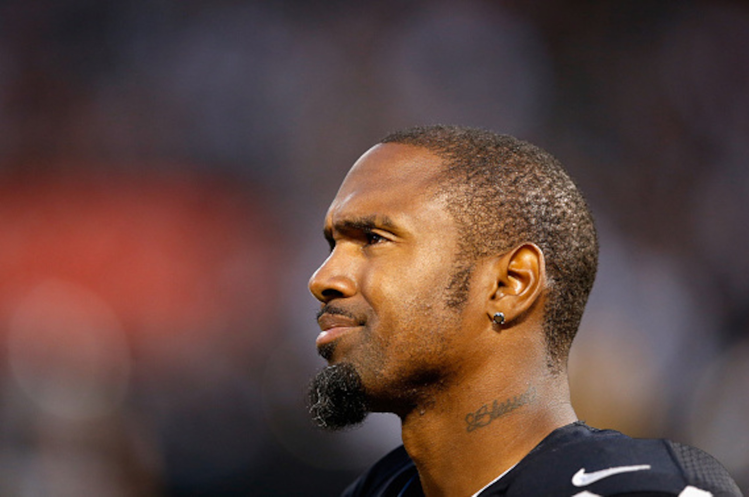 OAKLAND, CA - AUGUST 30:  Charles Woodson #24 of the Oakland Raiders stands on the sidelines during their game against the Arizona Cardinals at O.co Coliseum on August 30, 2015 in Oakland, California.  (Photo by Ezra Shaw/Getty Images)
