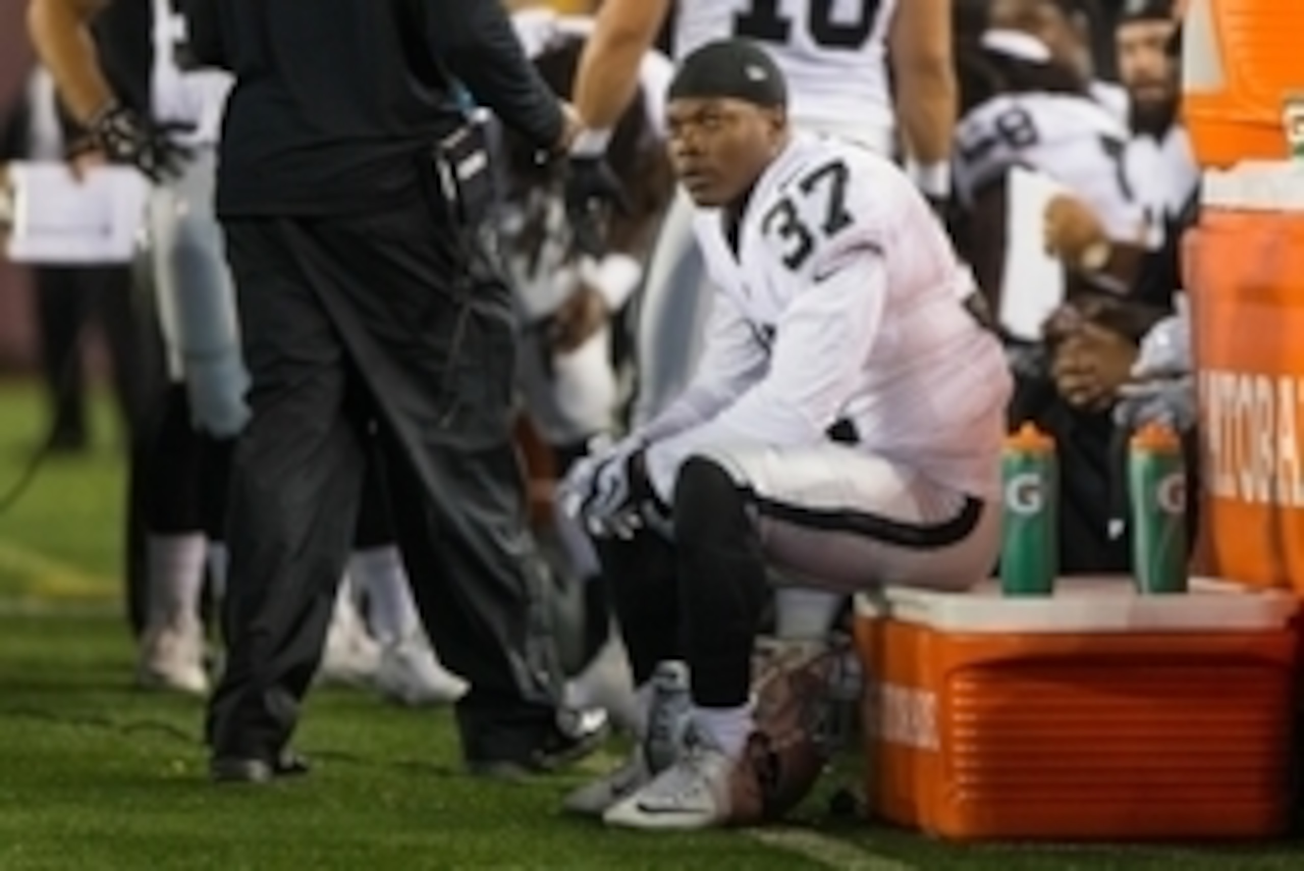 Aug 22, 2015; Minneapolis, MN, USA; Oakland Raiders safety Tevin McDonald (37) sits on the sidelines in the third quarter against the Minnesota Vikings at TCF Bank Stadium. The Minnesota Vikings beat the Oakland Raiders 20-12. Mandatory Credit: Brad Rempe
