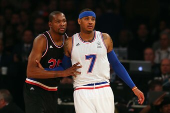 NEW YORK, NY - FEBRUARY 15:  Carmelo Anthony #7 of the New York Knicks and the Eastern Conference looks on against Kevin Durant #35 of the Oklahoma City Thunder and the Western Conference during the 2015 NBA All-Star Game at Madison Square Garden on Febru