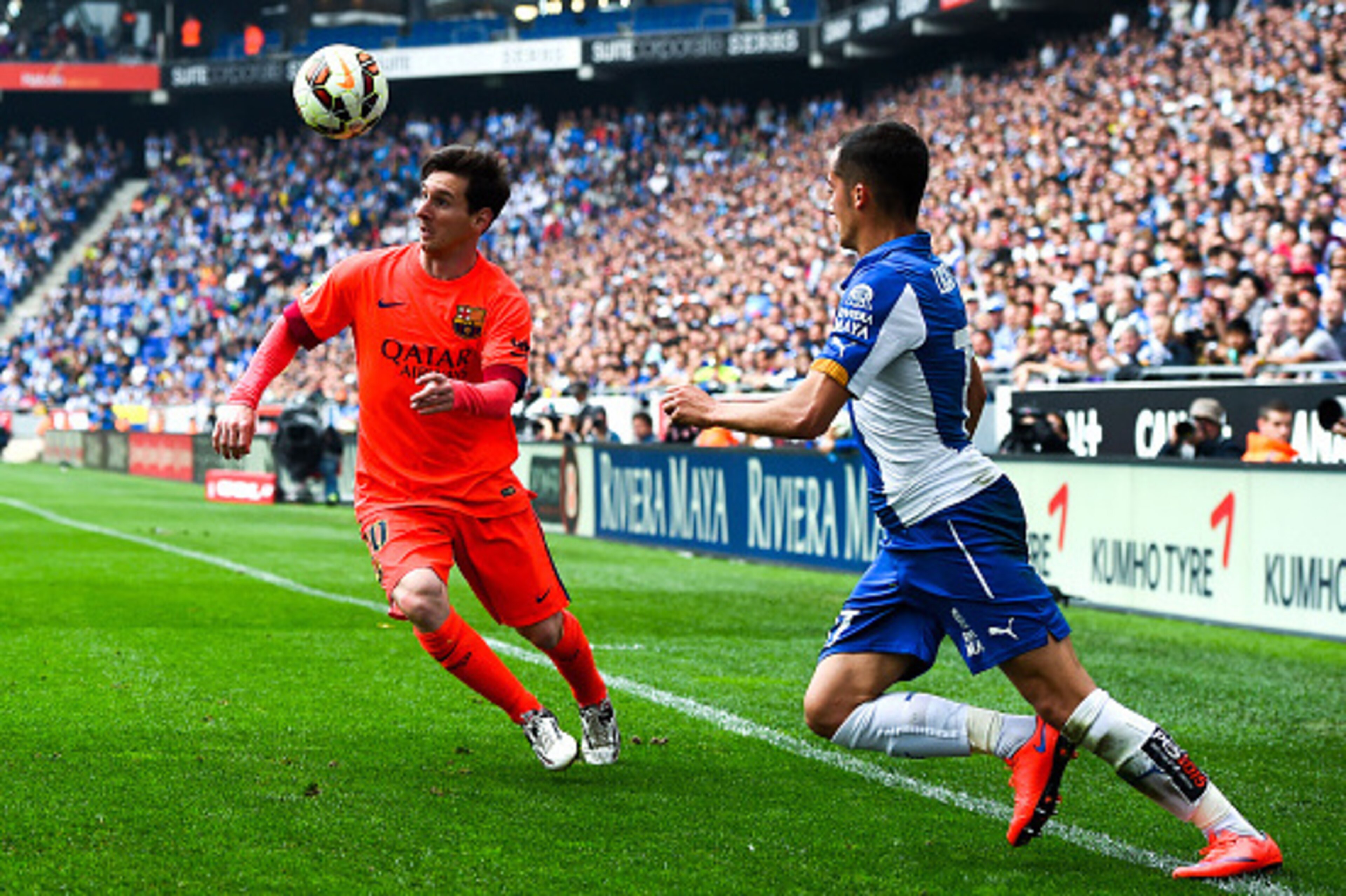 BARCELONA, SPAIN - APRIL 25:  Lionel Messi of FC Barcelona competes for the ball with Lucas Vazquez of RCD Espanyol during the La Liga match between RCD Espanyol and FC Barcelona at Cornella-El Prat Stadium on April 25, 2015 in Barcelona, Spain.  (Photo b