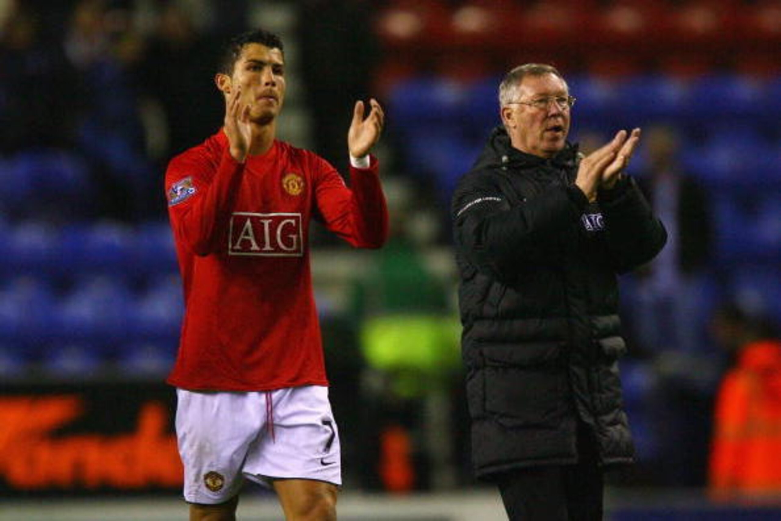 WIGAN, ENGLAND - MAY 13:  Sir Alex Ferguson the manager of Manchester United and Cristiano Ronaldo celebrate after the Barclays Premier League match between Wigan Athletic and Manchester United at the JJB Stadium on May 13, 2009 in Wigan, England.  (Photo