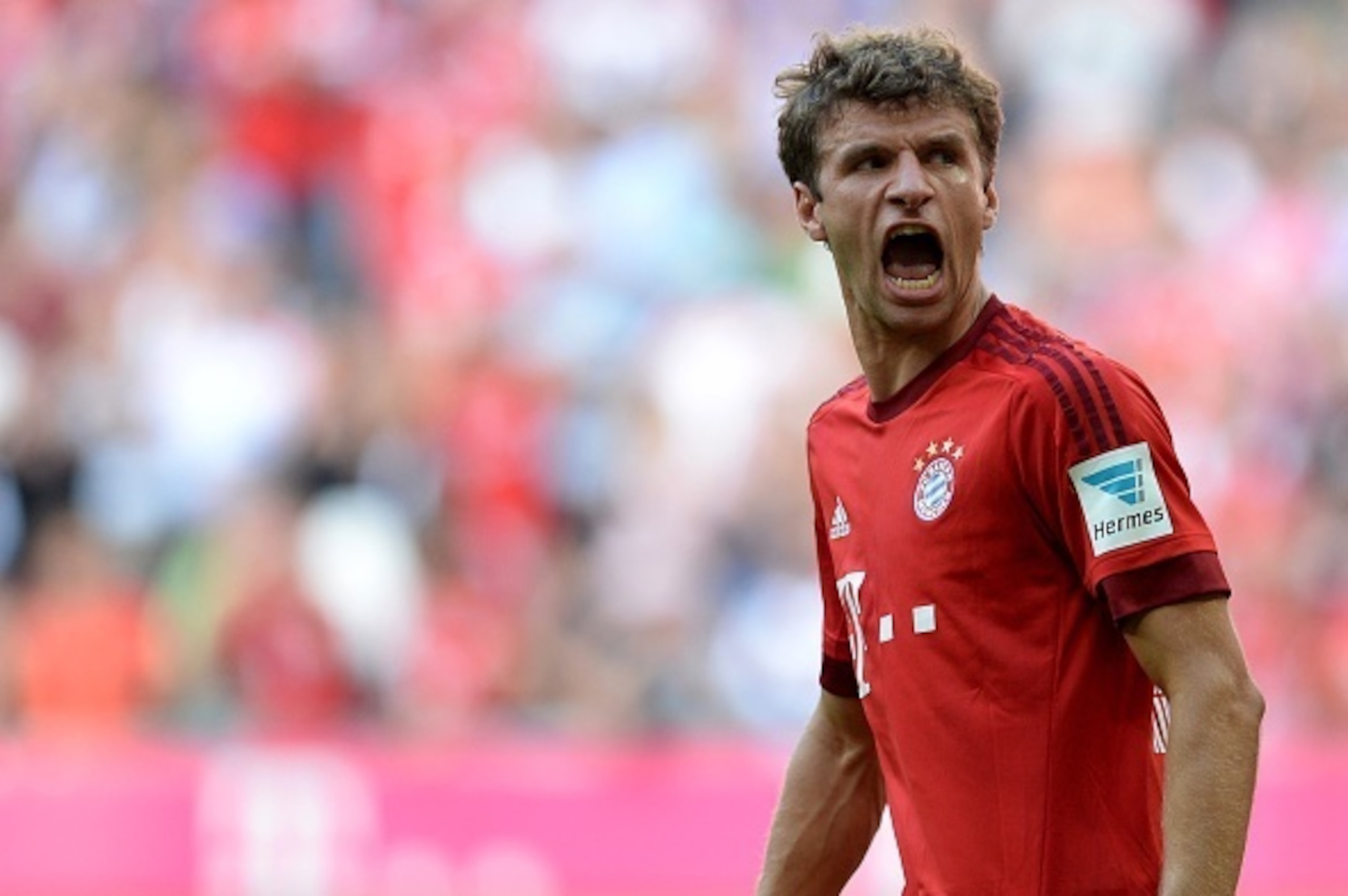 Bayern Munich's striker Thomas Mueller celebrates after the second Bayern goal during the German first division Bundesliga football match FC Bayern Munich v FC Augsburg, in Munich, on September 12, 2015. AFP PHOTO /CHRISTOF STACHE
RESTRICTIONS: DURING M Bayern Munich's striker Thomas Mueller celebrates after the second Bayern goal during the German first division Bundesliga football match FC Bayern Munich v FC Augsburg, in Munich, on September 12, 2015. AFP PHOTO /CHRISTOF STACHE
RESTRICTIONS: DURING M
