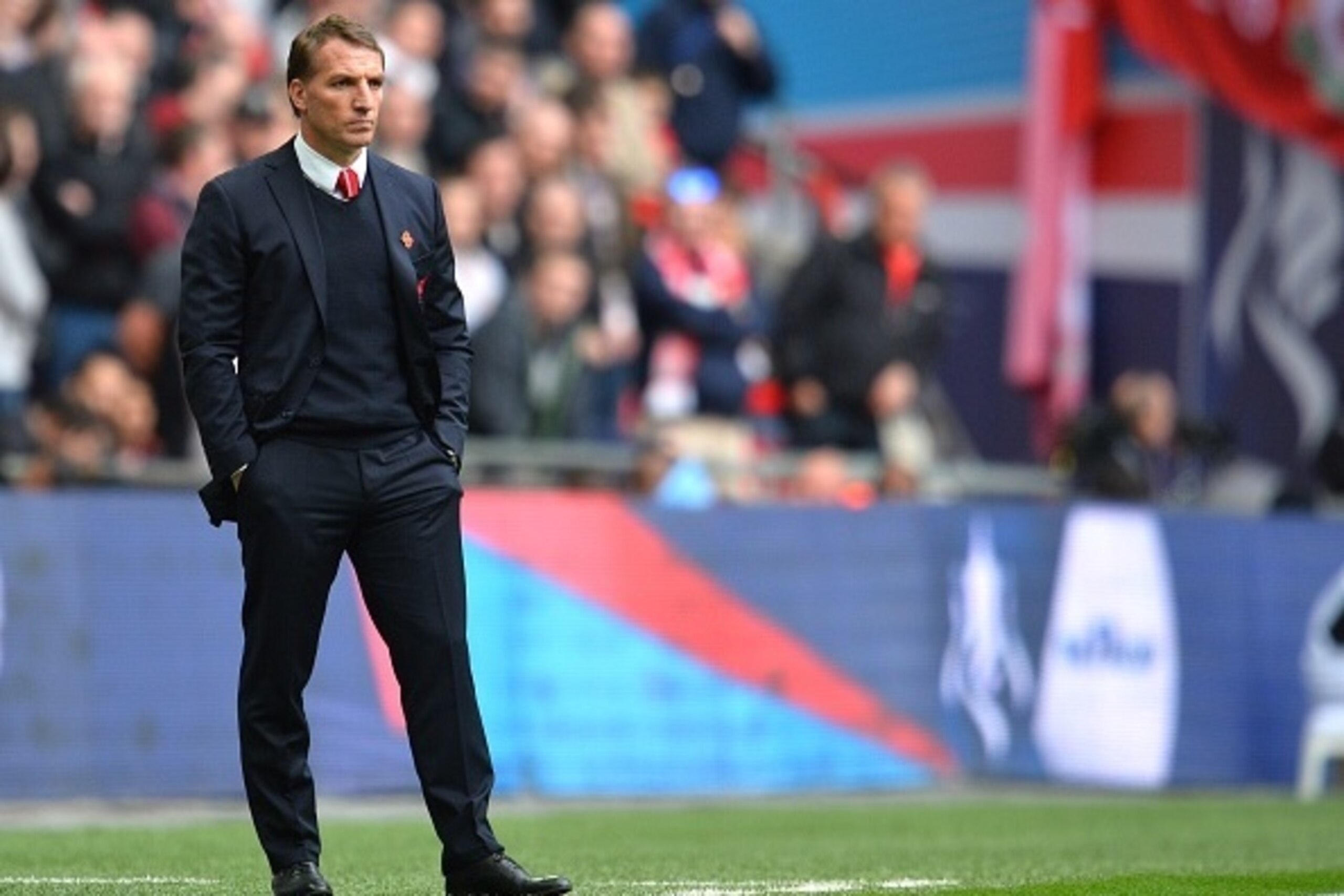 Liverpool's Northern Irish manager  Brendan Rodgers looks on during the FA Cup semi-final between Aston Villa and Liverpool at Wembley stadium in London on April 19, 2015.
AFP PHOTO / GLYN KIRK
NOT FOR MARKETING OR ADVERTISING USE / RESTRICTED TO EDITORIA