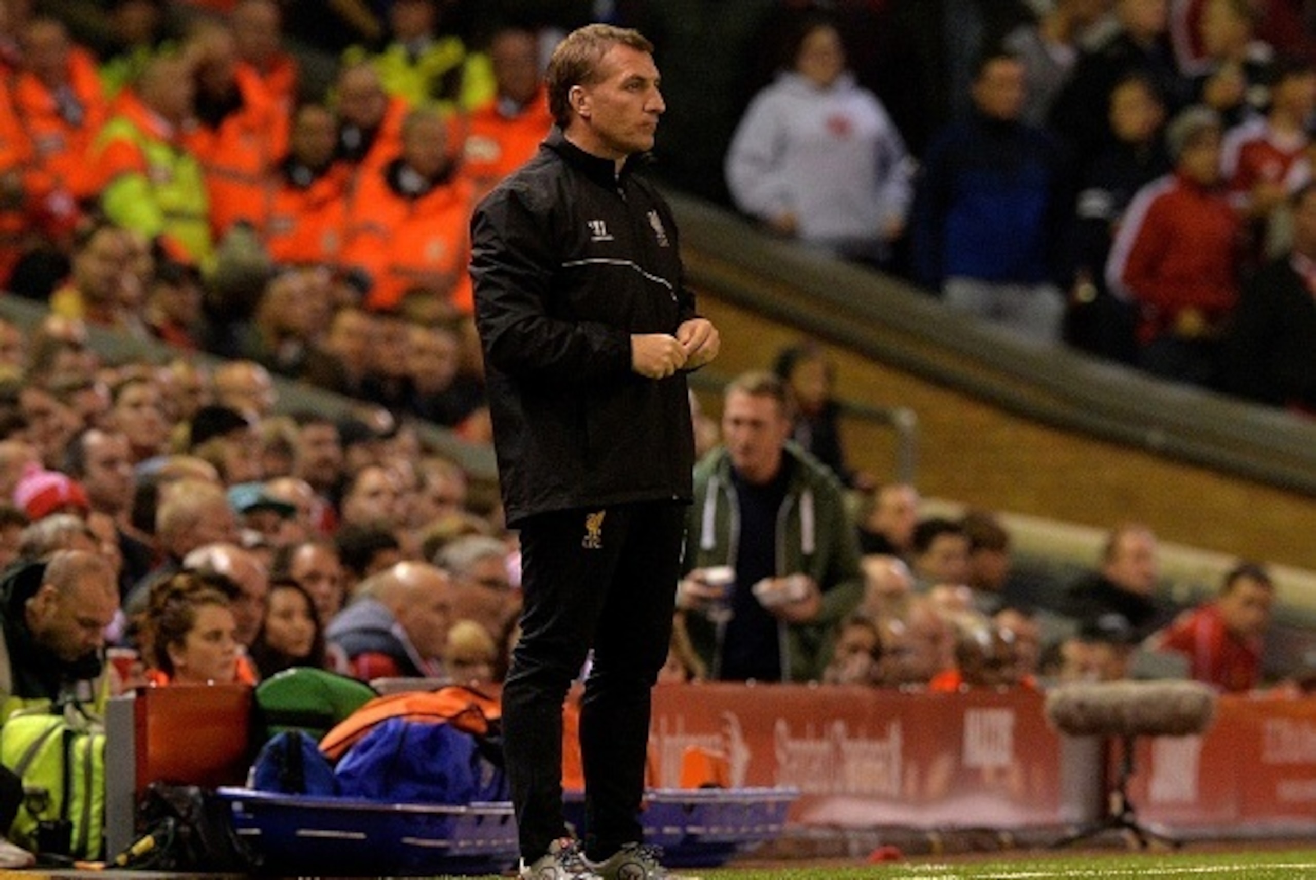 Liverpool's Northern Irish manager  Brendan Rodgers looks on during extra time in the English League Cup third round football match between Liverpool and Middlesbrough at Anfield in Liverpool, north west England on September 23, 2014. AFP PHOTO / PAUL ELL