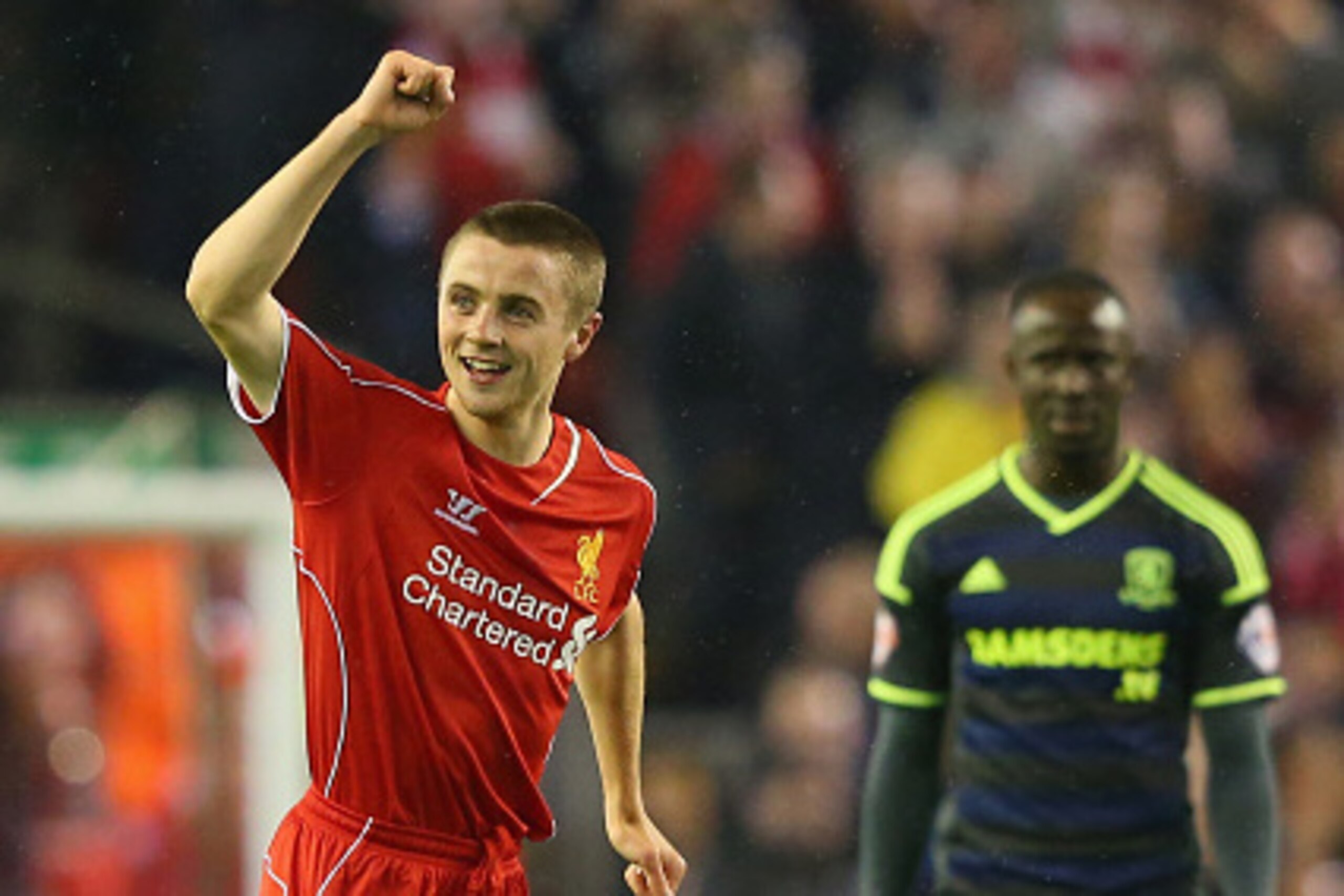 LIVERPOOL, ENGLAND - SEPTEMBER 23:  Jordan Rossiter of Liverpool celebrates after scoring the opening goal during the Capital One Cup Third Round match between Liverpool and Middlesbrough at Anfield on September 23, 2014 in Liverpool, England.  (Photo by 