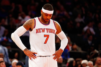 NEW YORK, NY - DECEMBER 07:  (NEW YORK DAILIES OUT)    Carmelo Anthony #7 of the New York Knicks looks on against the Portland Trail Blazers at Madison Square Garden on December 7, 2014 in New York City. The Trail Blazers defeated the Knicks 103-99. NOTE 