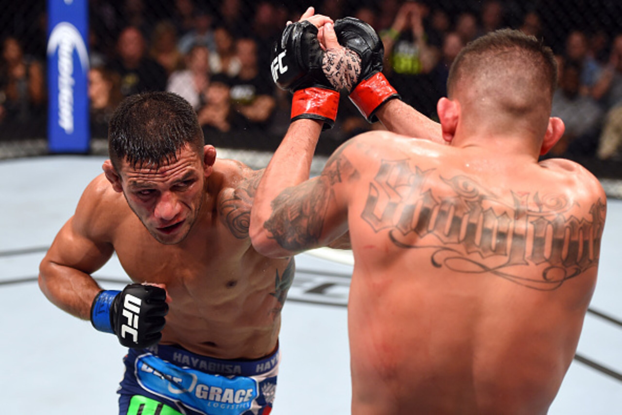 DALLAS, TX - MARCH 14: (L-R) Rafael dos Anjos of Brazil punches Anthony Pettis in their UFC lightweight championship bout during the UFC 185 event at the American Airlines Center on March 14, 2015 in Dallas, Texas. (Photo by Josh Hedges/Zuffa LLC/Zuffa L DALLAS, TX - MARCH 14: (L-R) Rafael dos Anjos of Brazil punches Anthony Pettis in their UFC lightweight championship bout during the UFC 185 event at the American Airlines Center on March 14, 2015 in Dallas, Texas. (Photo by Josh Hedges/Zuffa LLC/Zuffa L