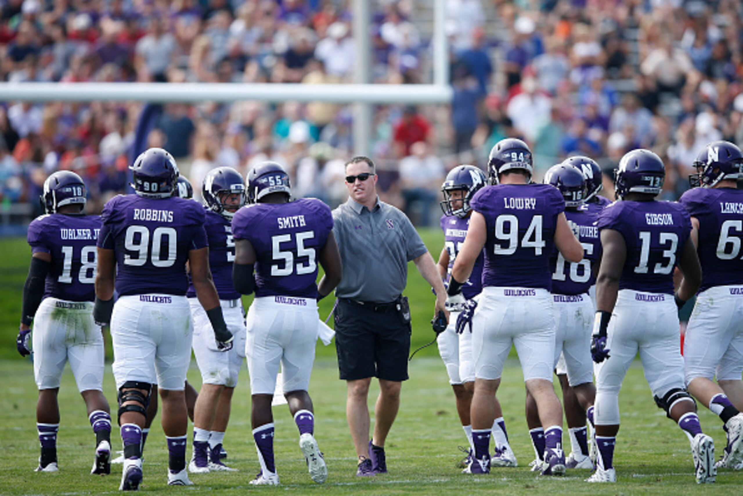 EVANSTON, IL - SEPTEMBER 5: Head coach Pat Fitzgerald of the Northwestern Wildcats talks to his team during the game against the Stanford Cardinal at Ryan Field on September 5, 2015 in Evanston, Illinois. Northwestern defeated Stanford 16-6. (Photo by Joe