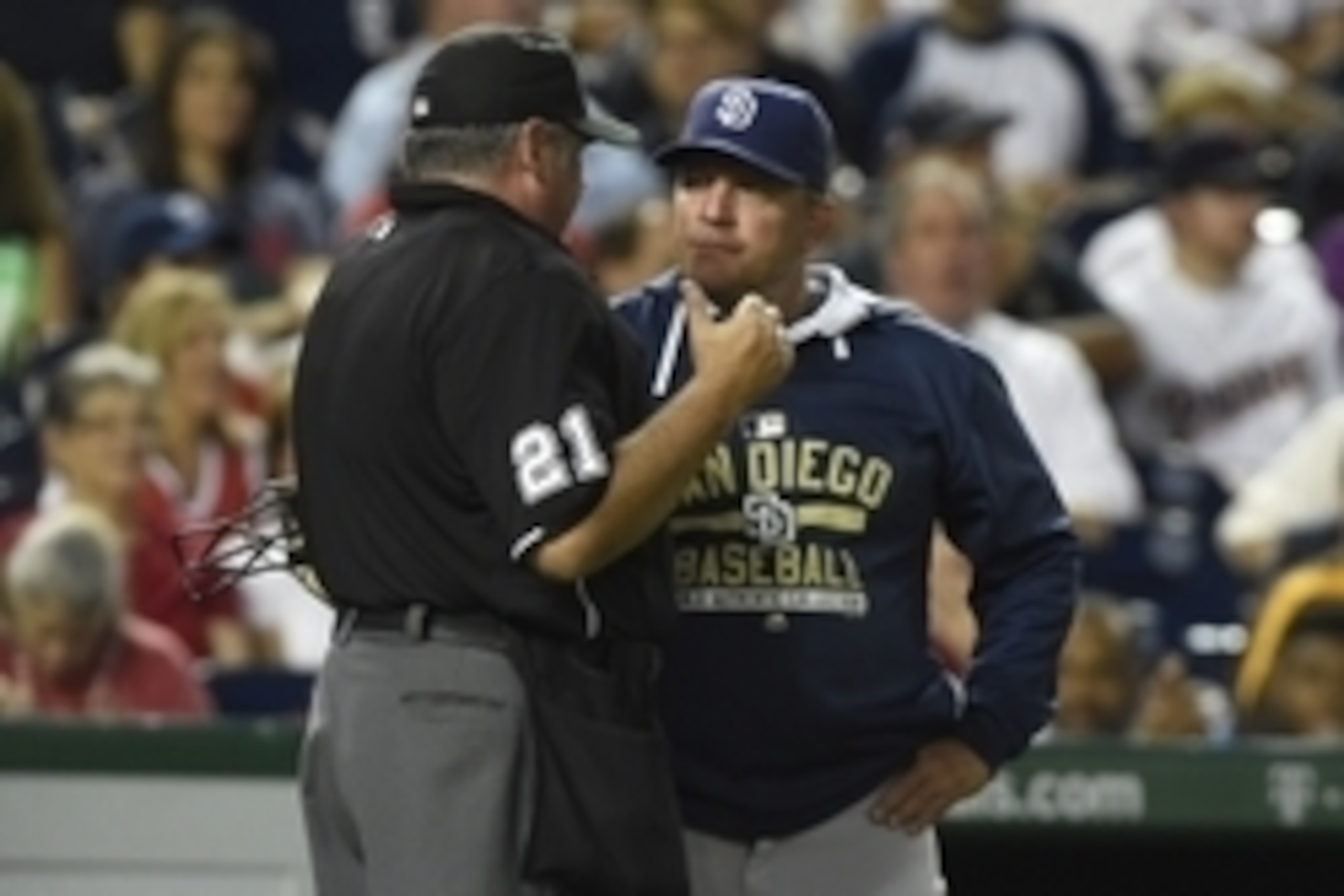 Aug 27, 2015; Washington, DC, USA; San Diego Padres interim manager Pat Murphy (24) speaks with home plate umpire Hunter Wendelstedt (21) during the third inning against the Washington Nationals at Nationals Park. Mandatory Credit: Tommy Gilligan-USA TODA