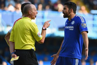 LONDON, ENGLAND - SEPTEMBER 19:  Diego Costa of Chelsea is shown a yellow card by referee Mike Dean during the Barclays Premier League match between Chelsea and Arsenal at Stamford Bridge on September 19, 2015 in London, United Kingdom.  (Photo by Ross Ki