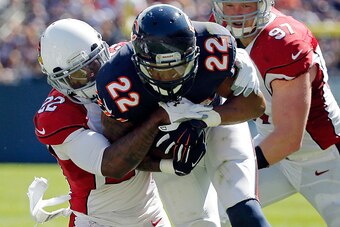 CHICAGO, IL - SEPTEMBER 20: Matt Forte #22 of the Chicago Bears is tackled by Tony Jefferson #22 of the Arizona Cardinals during the second quarter at Soldier Field on September 20, 2015 in Chicago, Illinois.  (Photo by Jon Durr/Getty Images)