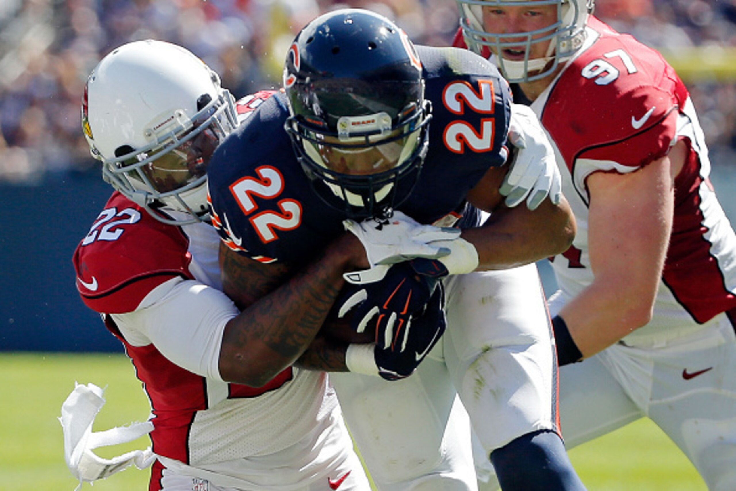 CHICAGO, IL - SEPTEMBER 20: Matt Forte #22 of the Chicago Bears is tackled by Tony Jefferson #22 of the Arizona Cardinals during the second quarter at Soldier Field on September 20, 2015 in Chicago, Illinois.  (Photo by Jon Durr/Getty Images)