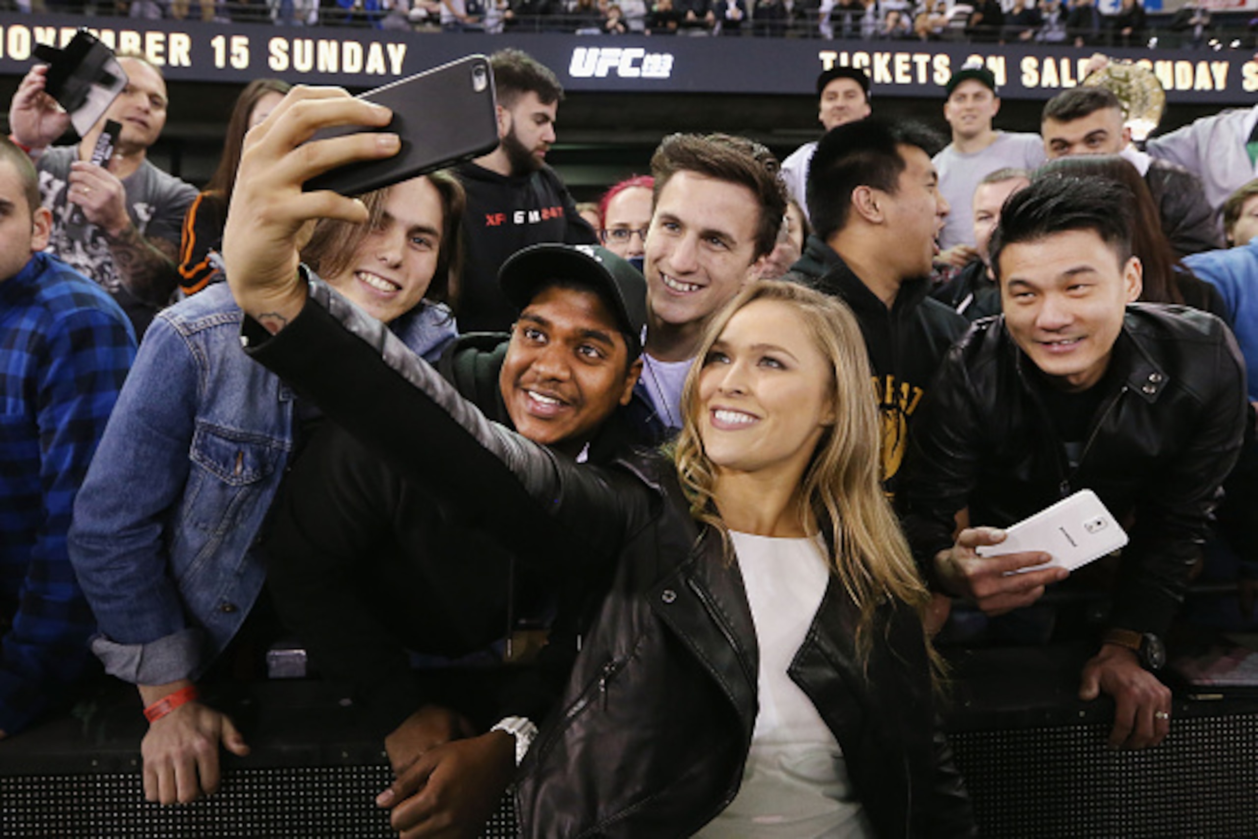 MELBOURNE, AUSTRALIA - SEPTEMBER 16:  Ronda Rousey, UFC Women's Bantamweight Champion, takes selfies with fans during the UFC 193 media event at Etihad Stadium on September 16, 2015 in Melbourne, Australia.  (Photo by Michael Dodge/Zuffa LLC/Zuffa LLC via