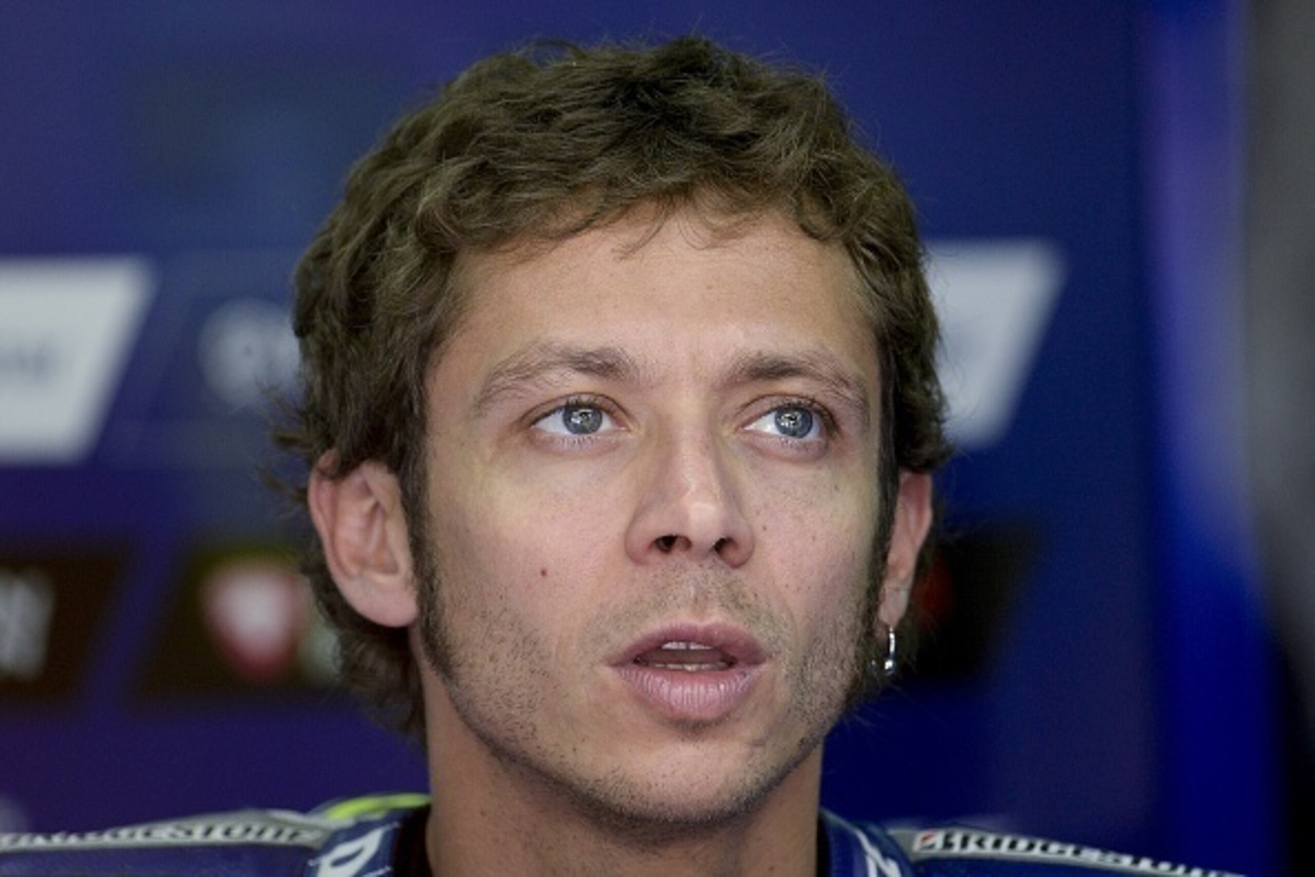 Movistar Yamaha MotoGP's Italian rider Valentino Rossi looks on in the pits during the first free practice sessions at the MotoGP at the Barcelona-Catalunya racetrack in Montmelo, near Barcelona, on June 12, 2015 ahead of the Catalunya Moto Grand Pix. AFP