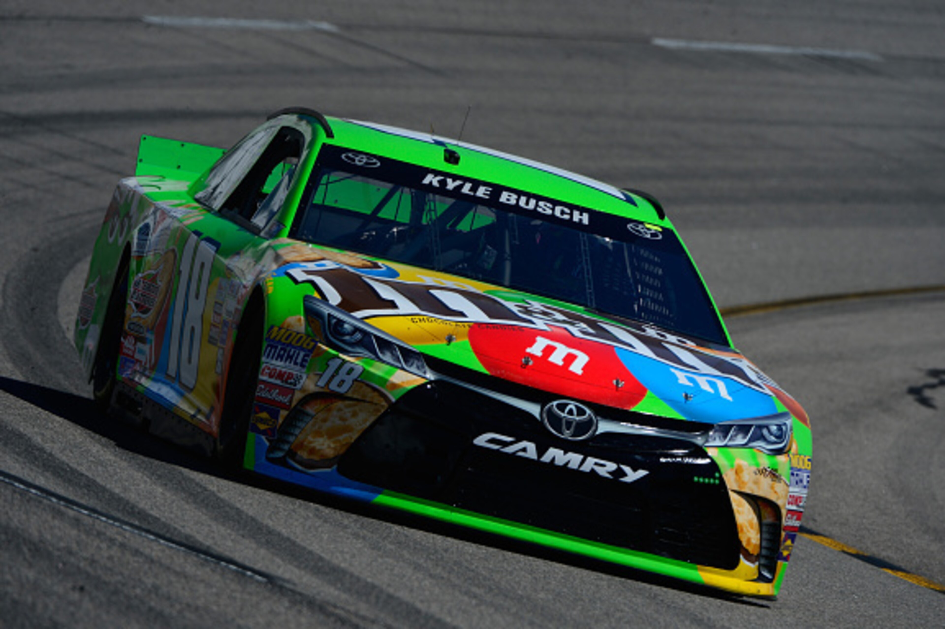 RICHMOND, VA - SEPTEMBER 11: Kyle Busch, driver of the #18 M&M's Crispy/American Heritage Chocolate Toyota, practices for the NASCAR Sprint Cup Series Federated Auto Parts 400 at Richmond International Raceway on September 11, 2015 in Richmond, Virginia. RICHMOND, VA - SEPTEMBER 11: Kyle Busch, driver of the #18 M&M's Crispy/American Heritage Chocolate Toyota, practices for the NASCAR Sprint Cup Series Federated Auto Parts 400 at Richmond International Raceway on September 11, 2015 in Richmond, Virginia.