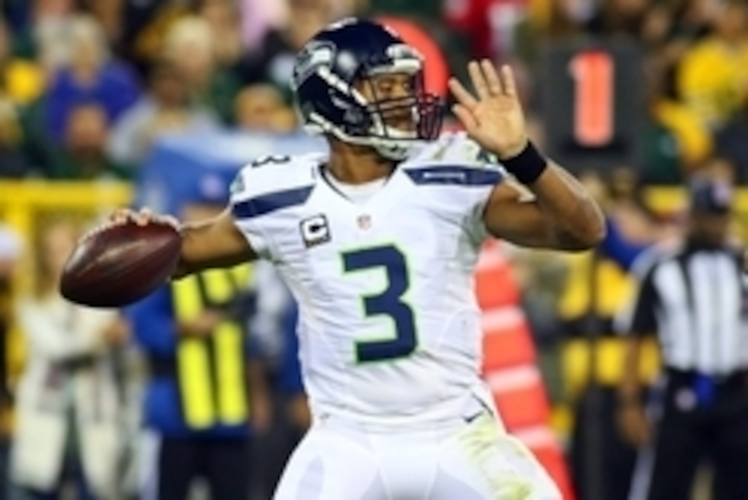 Sep 20, 2015; Green Bay, WI, USA; Seattle Seahawks quarterback Russell Wilson (3) passes the ball against the Green Bay Packers during the second half at Lambeau Field. Mandatory Credit: Ray Carlin-USA TODAY Sports Sep 20, 2015; Green Bay, WI, USA; Seattle Seahawks quarterback Russell Wilson (3) passes the ball against the Green Bay Packers during the second half at Lambeau Field. Mandatory Credit: Ray Carlin-USA TODAY Sports
