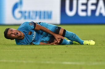 ROME, ITALY - SEPTEMBER 16:  Rafinha of FC Barcelona  after clashes with Radja Nainggolan of AS Roma during the UEFA Champions League Group E match between AS Roma and FC Barcelona, at Olimpico Stadium on September 16, 2015 in Rome, Italy.  (Photo by Gius