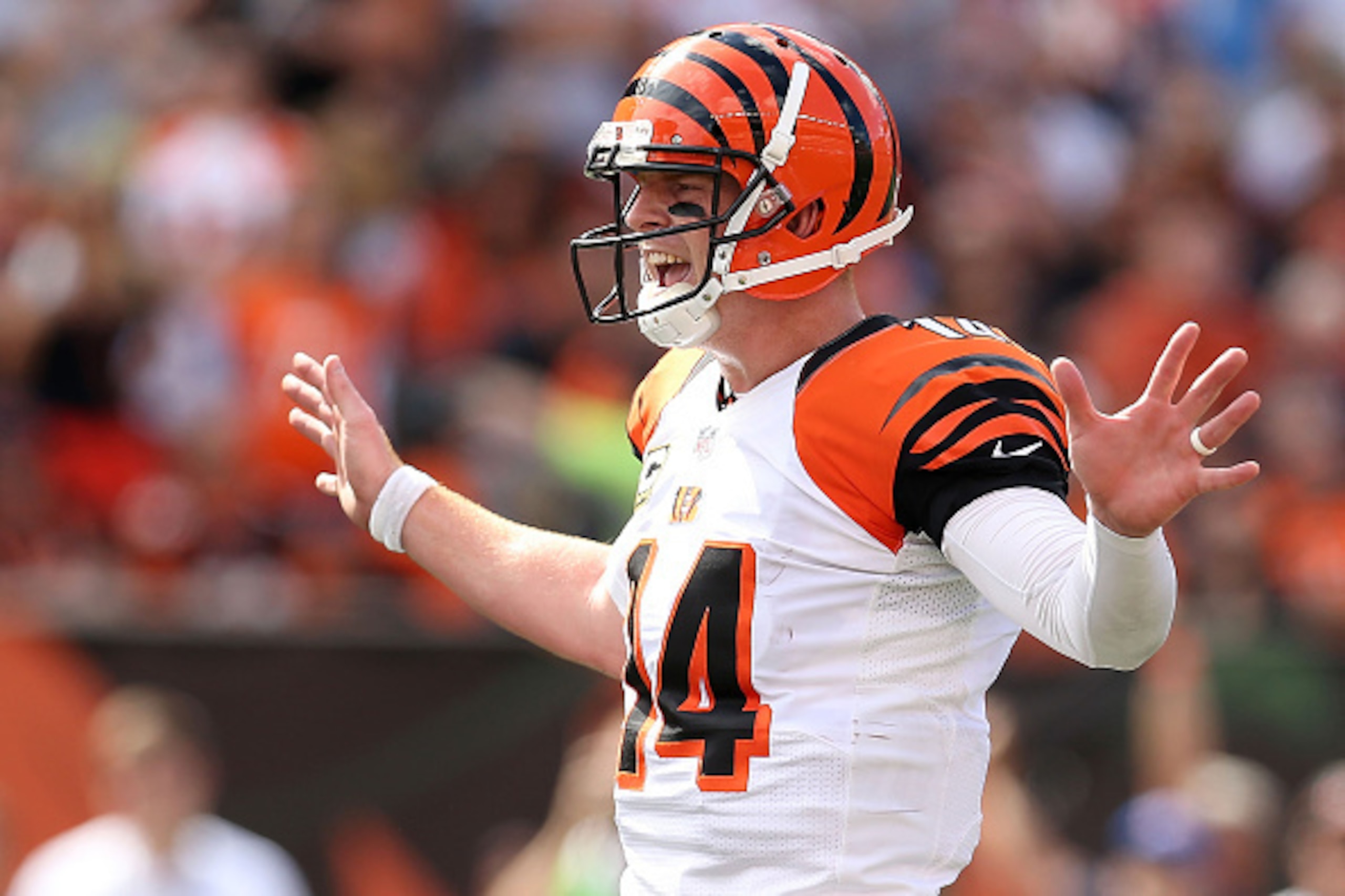 CINCINNATI, OH - SEPTEMBER 20:  Andy Dalton #14 of the Cincinnati Bengals calls a play at the line of scrimmage during the third quarter of the game against the San Diego Chargers at Paul Brown Stadium on September 20, 2015 in Cincinnati, Ohio. (Photo by 