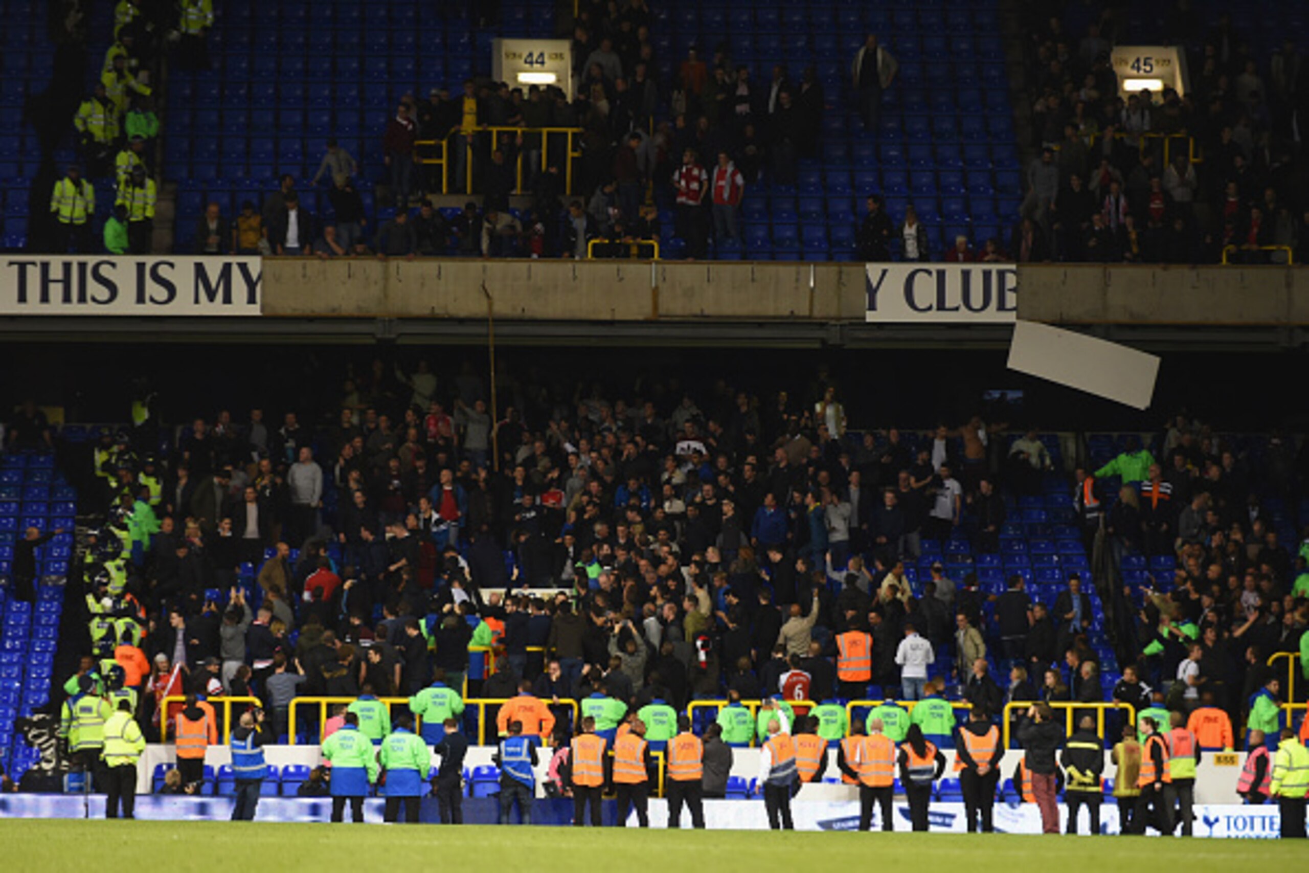 LONDON, ENGLAND - SEPTEMBER 23: Arsenal fans remove hoardings after their victory in the Capital One Cup third round match between Tottenham Hotspur and Arsenal at White Hart Lane on September 23, 2015 in London, England. (Photo by Tom Dulat/Getty Image LONDON, ENGLAND - SEPTEMBER 23: Arsenal fans remove hoardings after their victory in the Capital One Cup third round match between Tottenham Hotspur and Arsenal at White Hart Lane on September 23, 2015 in London, England. (Photo by Tom Dulat/Getty Image
