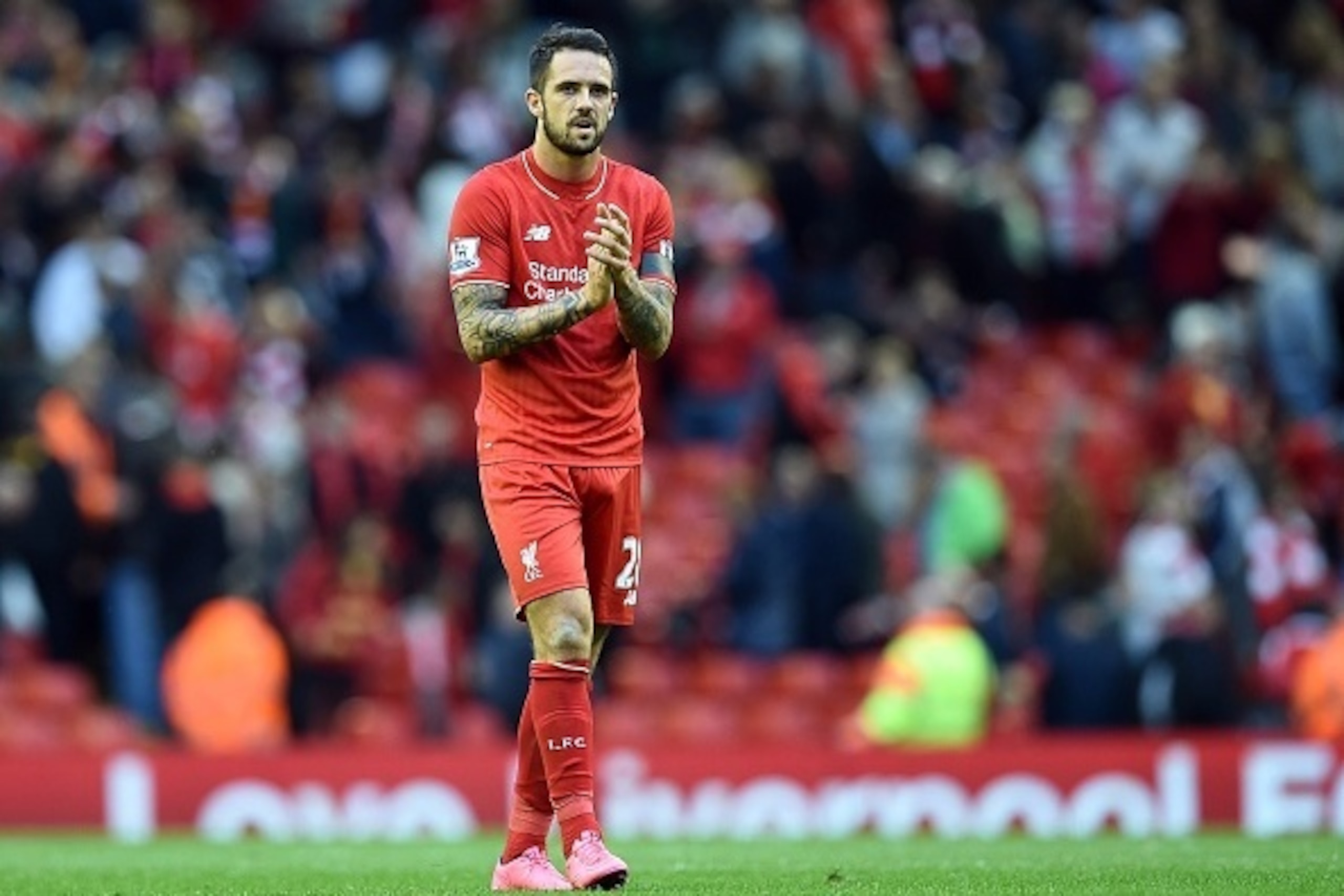 Liverpool's English striker Danny Ings applauds supporters after the English Premier League football match between Liverpool and Norwich City at the Anfield stadium in Liverpool, north-west England on September 20, 2015. AFP PHOTO / PAUL ELLIS

RESTRICTED