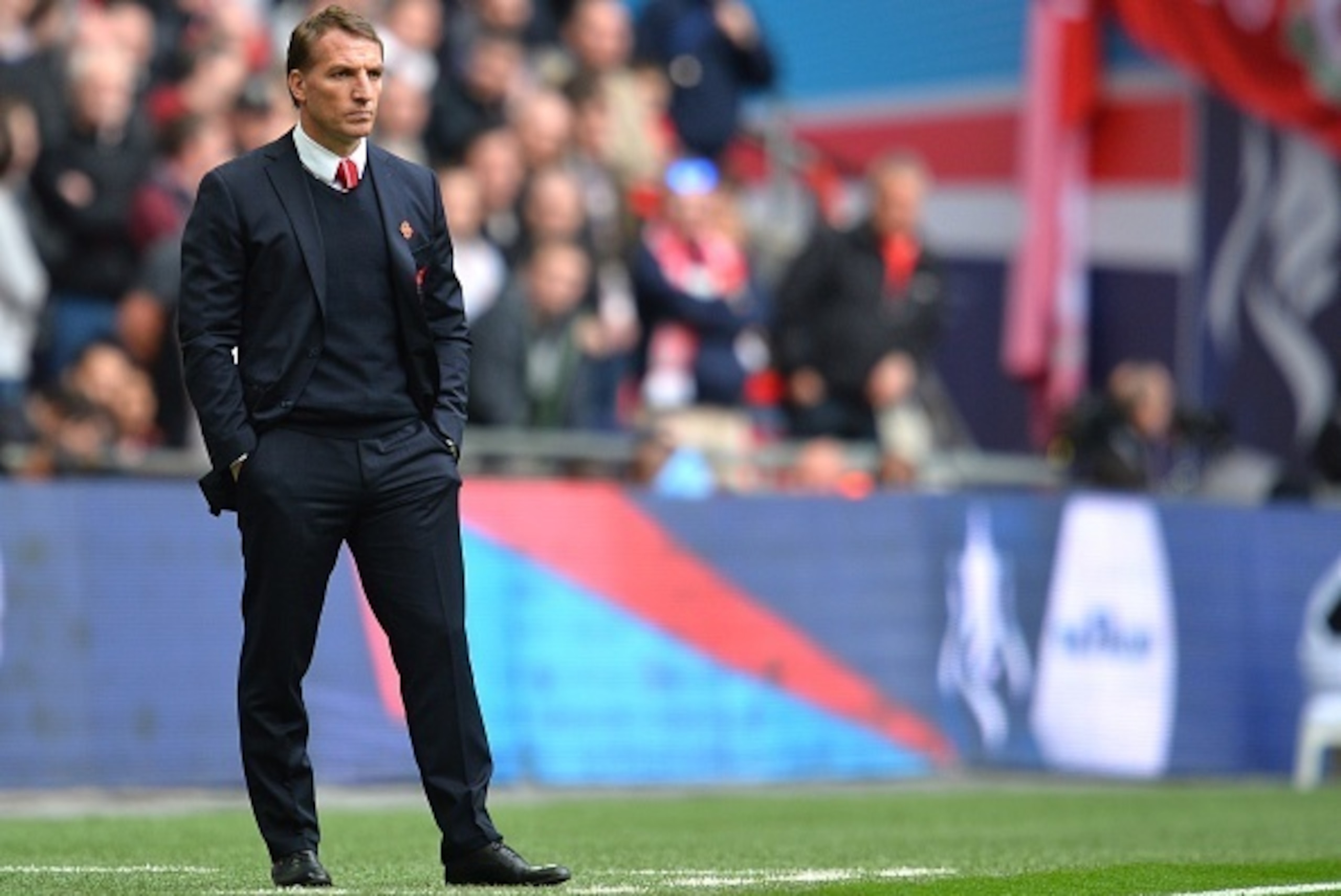 Liverpool's Northern Irish manager Brendan Rodgers looks on during the FA Cup semi-final between Aston Villa and Liverpool at Wembley stadium in London on April 19, 2015.
AFP PHOTO / GLYN KIRK
NOT FOR MARKETING OR ADVERTISING USE / RESTRICTED TO EDITORIA Liverpool's Northern Irish manager Brendan Rodgers looks on during the FA Cup semi-final between Aston Villa and Liverpool at Wembley stadium in London on April 19, 2015.
AFP PHOTO / GLYN KIRK
NOT FOR MARKETING OR ADVERTISING USE / RESTRICTED TO EDITORIA