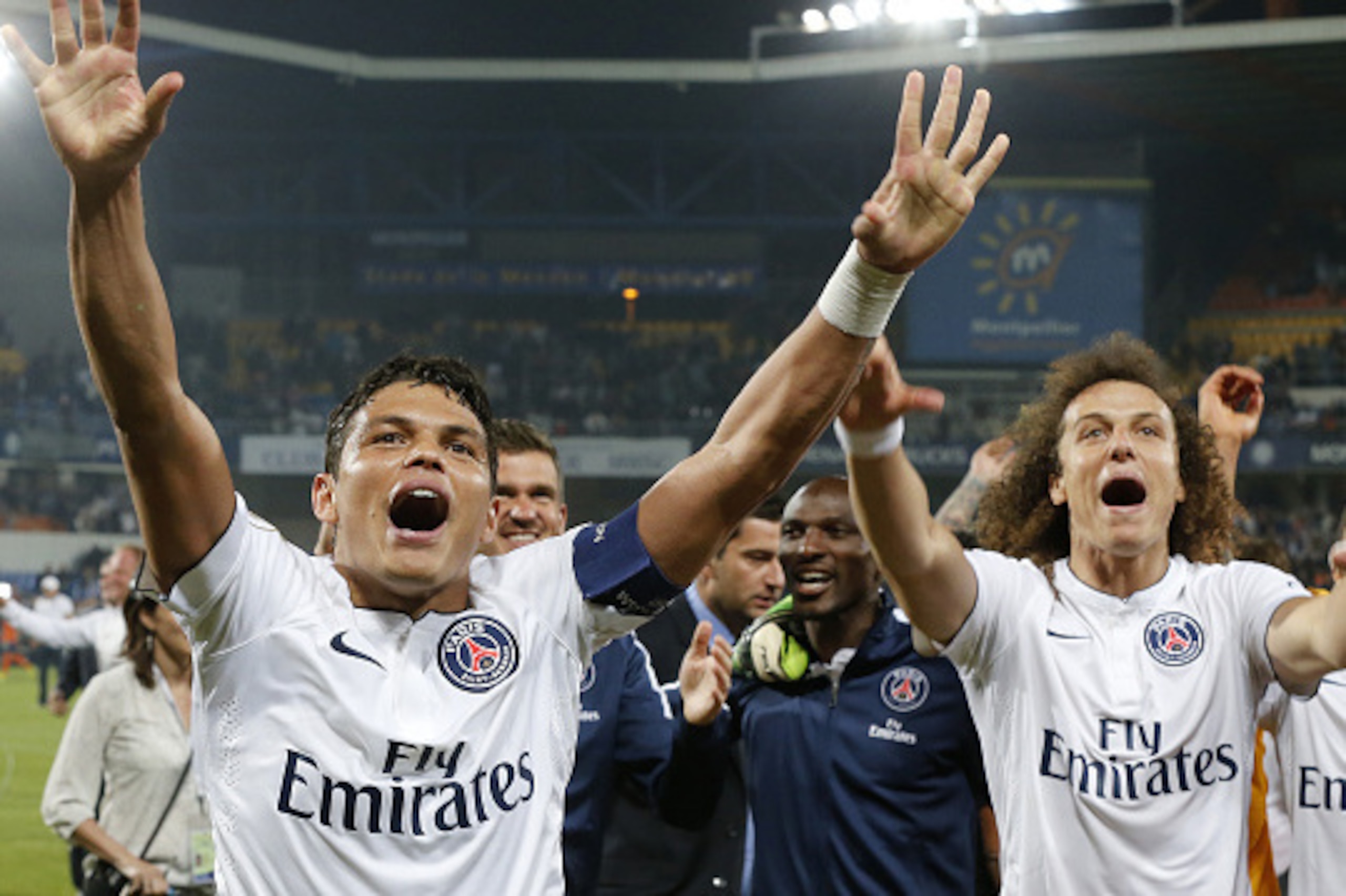 MONTPELLIER, FRANCE - MAY 16:  Thiago Silva and David Luiz of PSG celebrates the victory of PSG in French Ligue 1 Championship after their victory in the French Ligue 1 match between Montpellier Herault SC (MHSC) and Paris Saint-Germain (PSG) at Stade de 