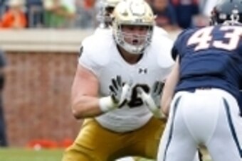 Sep 12, 2015; Charlottesville, VA, USA; Notre Dame Fighting Irish offensive lineman Quenton Nelson (56) blocks against the Virginia Cavaliers at Scott Stadium. Mandatory Credit: Geoff Burke-USA TODAY Sports