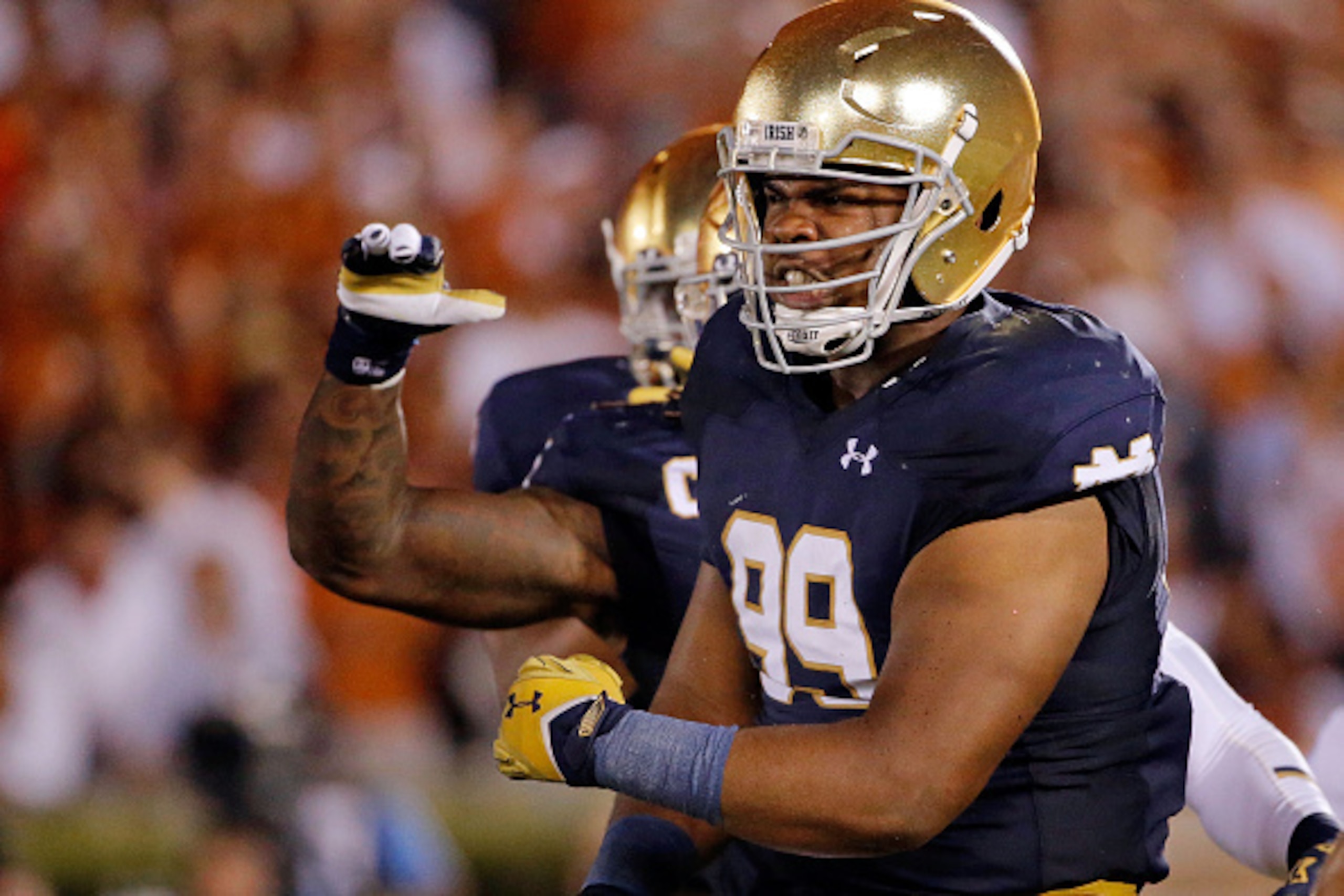 SOUTH BEND, IN - SEPTEMBER 05: Jerry Tillery #99 of the Notre Dame Fighting Irish celebrates after making a tackle against the Texas Longhorns during the second quarter at Notre Dame Stadium on September 5, 2015 in South Bend, Indiana.  (Photo by Jon Durr