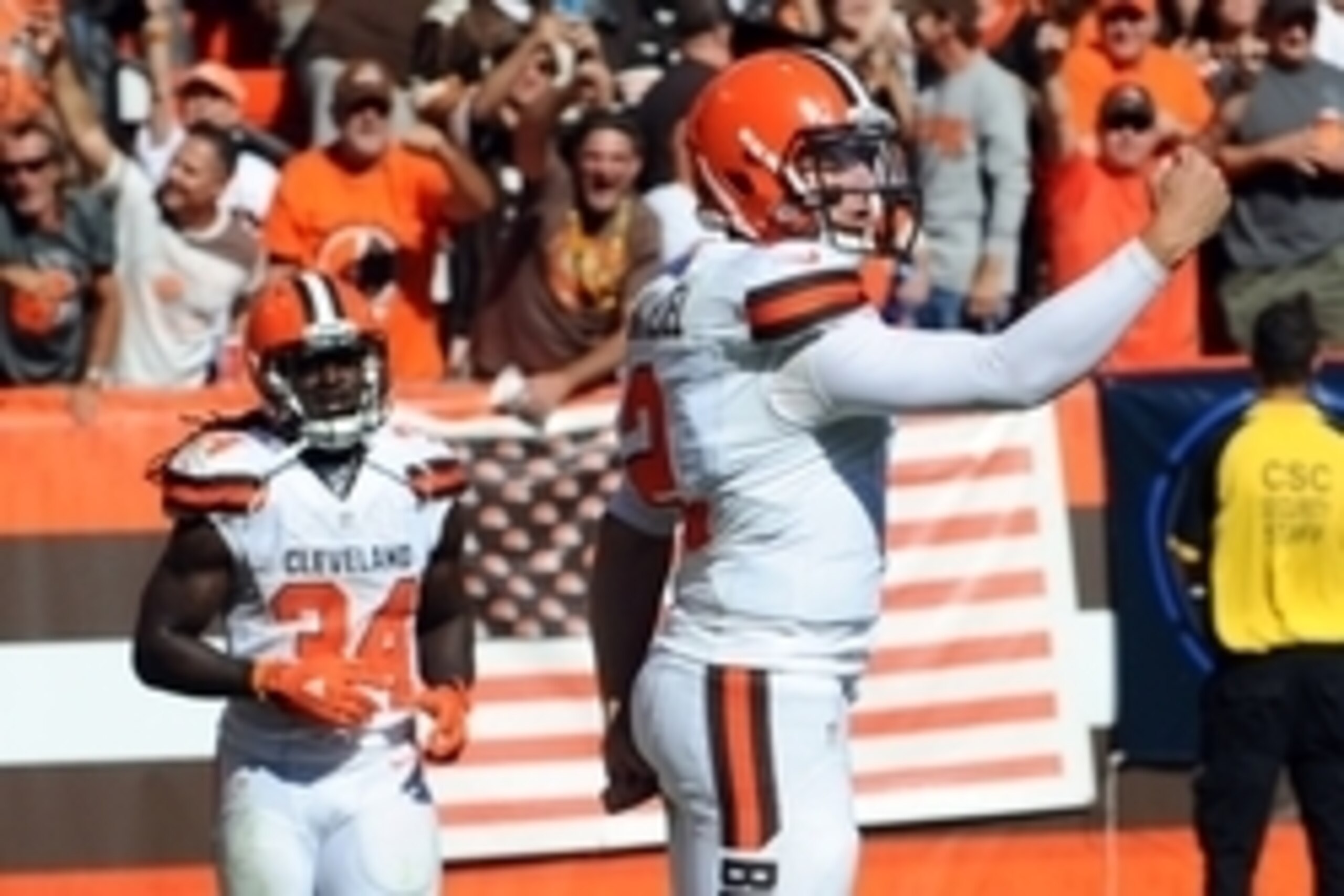 Sep 20, 2015; Cleveland, OH, USA; Cleveland Browns quarterback Johnny Manziel (2) pumps his fist after a fourth quarter touchdown throw to Cleveland Browns wide receiver Travis Benjamin (not pictured) against the Tennessee Titans at FirstEnergy Stadium. T