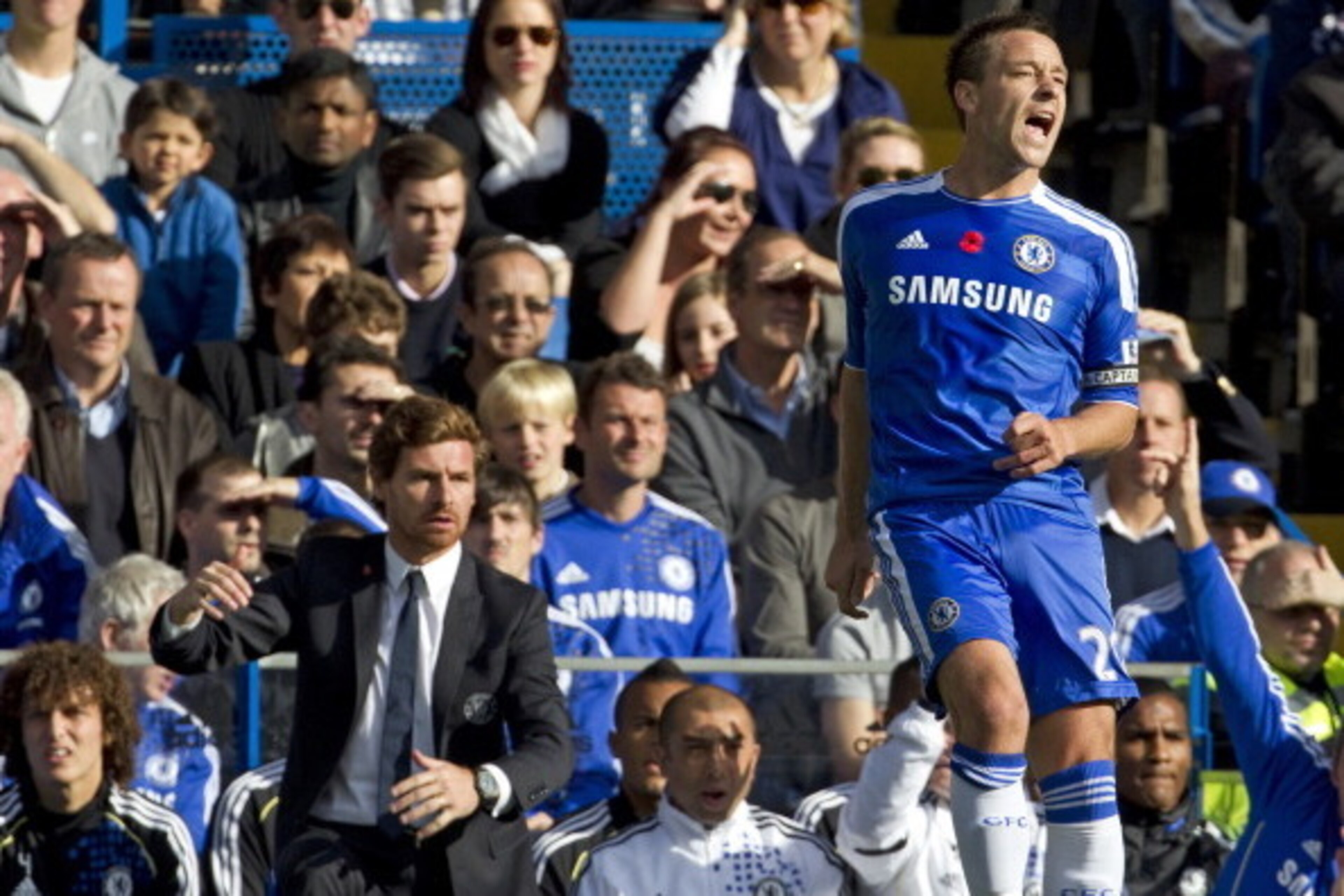 Chelsea's Portuguese manager Andre Villas-Boas (L) looks on as his captain John Terry (R) shouts out instruictions during the English Premier League football match between Chelsea and Arsenal at Stamford Bridge in London, on October 29, 2011. Arsenal won Chelsea's Portuguese manager Andre Villas-Boas (L) looks on as his captain John Terry (R) shouts out instruictions during the English Premier League football match between Chelsea and Arsenal at Stamford Bridge in London, on October 29, 2011. Arsenal won