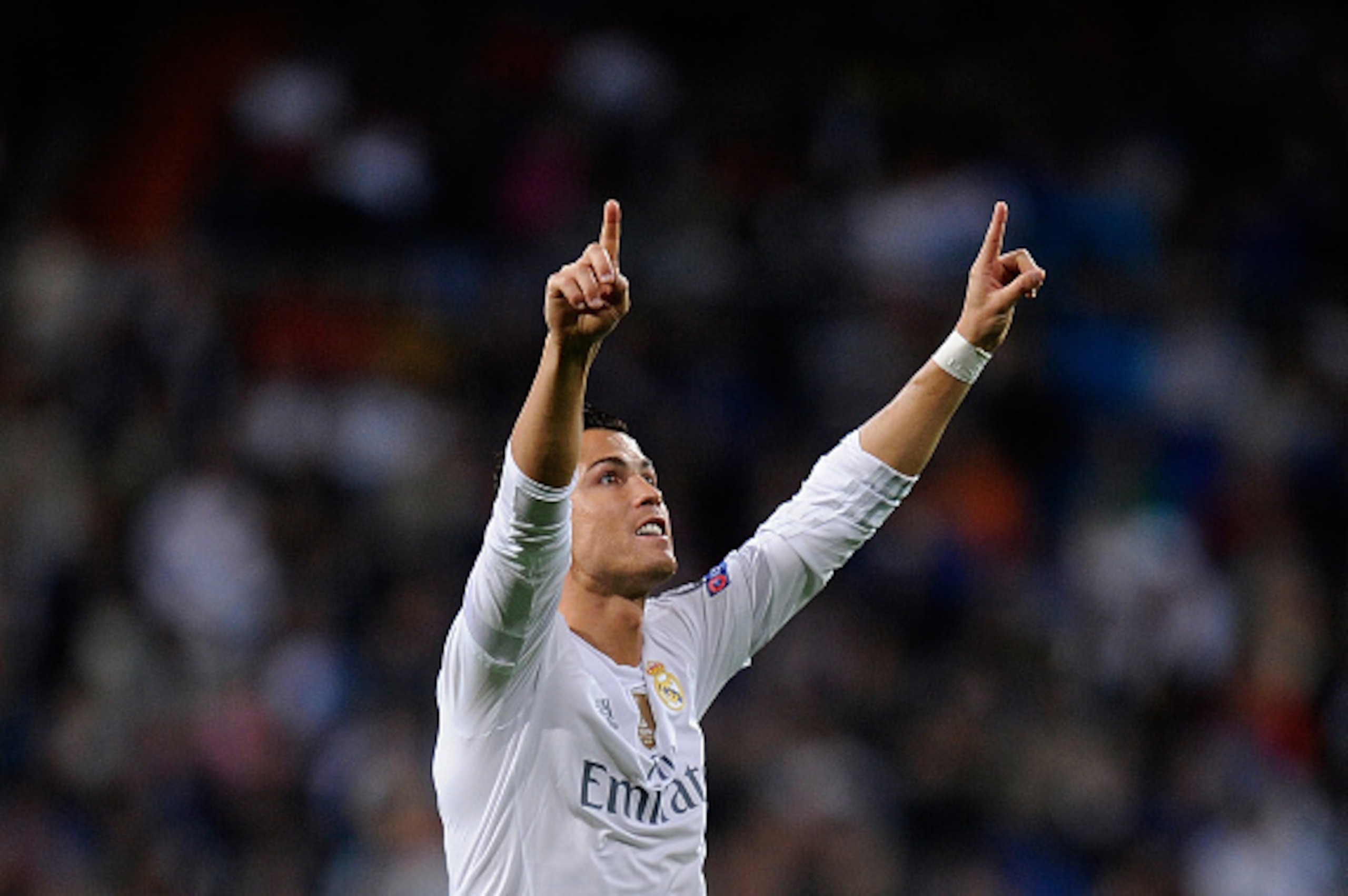MADRID, SPAIN - SEPTEMBER 15:  Cristiano Ronaldo of Real Madrid celebrates after scoring Real's 3rd goal from the penalty spot during the UEFA Champions League Group A match between Real Madrid and Shakhtar Donetsk at estadio Santiago Bernabeu on Septembe