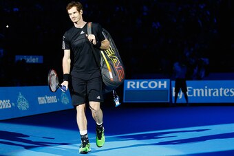 LONDON, ENGLAND - NOVEMBER 16: Andy Murray of Great Britain enters the court for the exhibition match against Novak Djokovic of Serbia on day eight of the Barclays ATP World Tour Finals at O2 Arena on November 16, 2014 in London, England. The Singles fina
