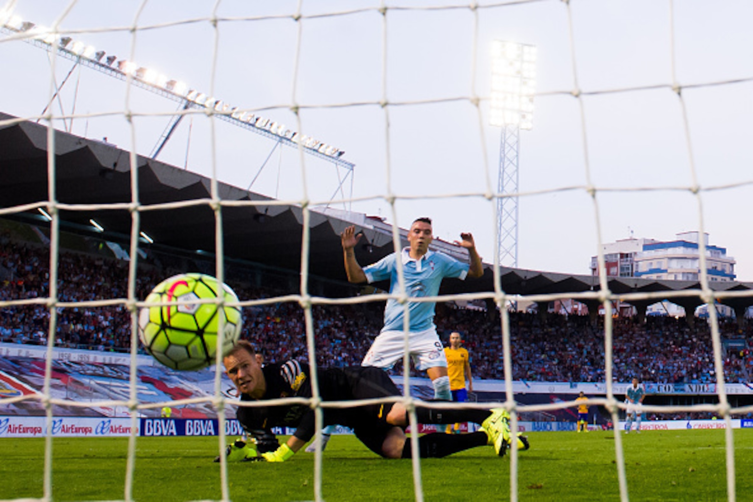 VIGO, SPAIN - SEPTEMBER 23: Marc-Andre Ter Stegen of FC Barcelona looks on as Manuel Agudo 'Nolito' (not seen) of Celta Vigo scores the opening goal and Iago Aspas celebrates during the La Liga match between Celta Vigo and FC Barcelona at Estadio Balaidos VIGO, SPAIN - SEPTEMBER 23: Marc-Andre Ter Stegen of FC Barcelona looks on as Manuel Agudo 'Nolito' (not seen) of Celta Vigo scores the opening goal and Iago Aspas celebrates during the La Liga match between Celta Vigo and FC Barcelona at Estadio Balaidos