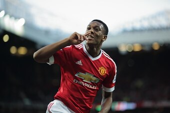 MANCHESTER, ENGLAND - SEPTEMBER 12:  Anthony Martial of Manchester United celebrates after scoring a goal to make it 3-1 on his debut during the Barclays Premier League match between Manchester United and Liverpool on September 12, 2015 in Manchester, Uni