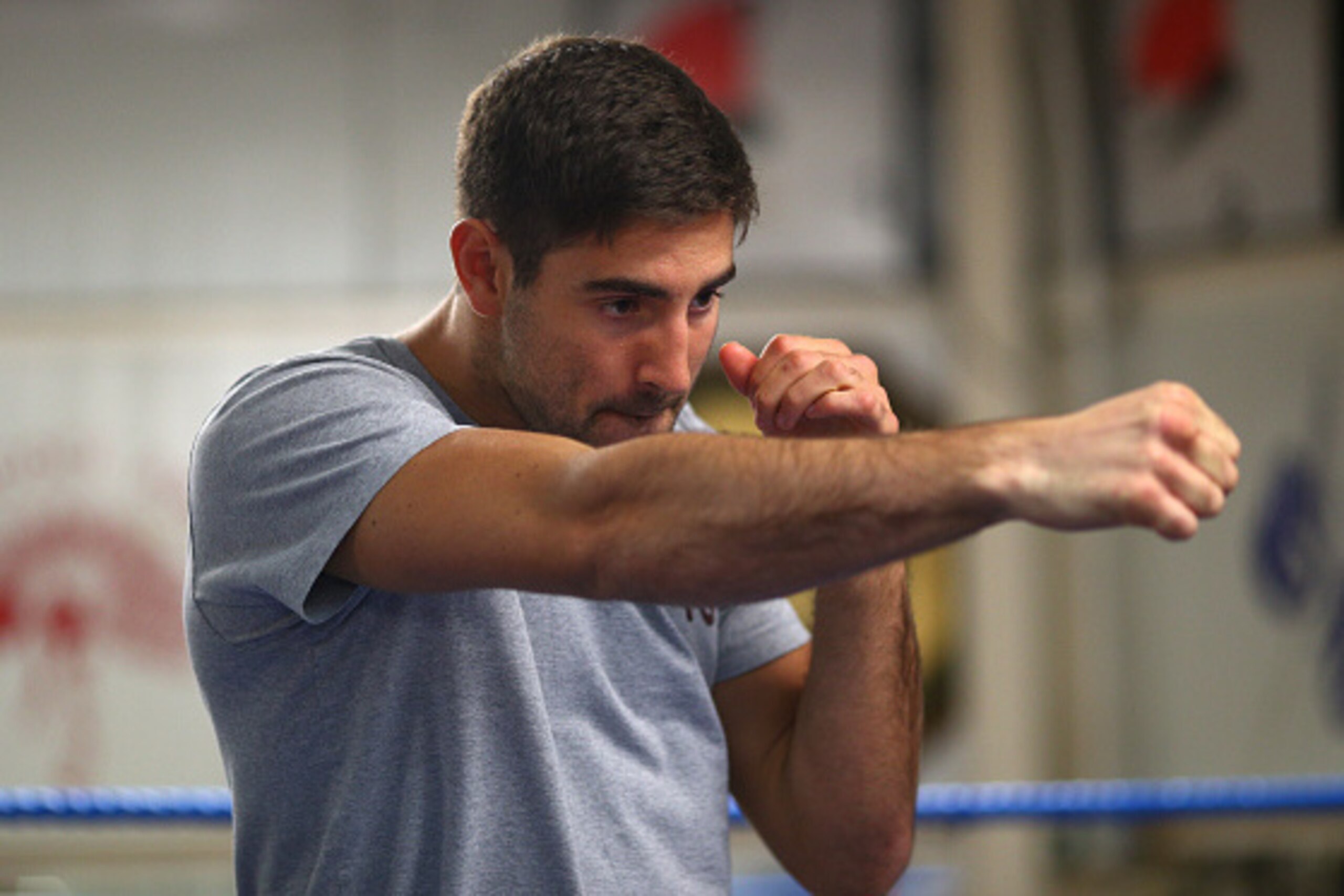 LONDON, ENGLAND - SEPTEMBER 22: Frank Buglioni of England shadow boxes during the Fedor Chudinov v Frank Buglioni Media Work Out at Peacock Gym on September 22, 2015 in London, United Kingdom. (Photo by Charlie Crowhurst/Getty Images)